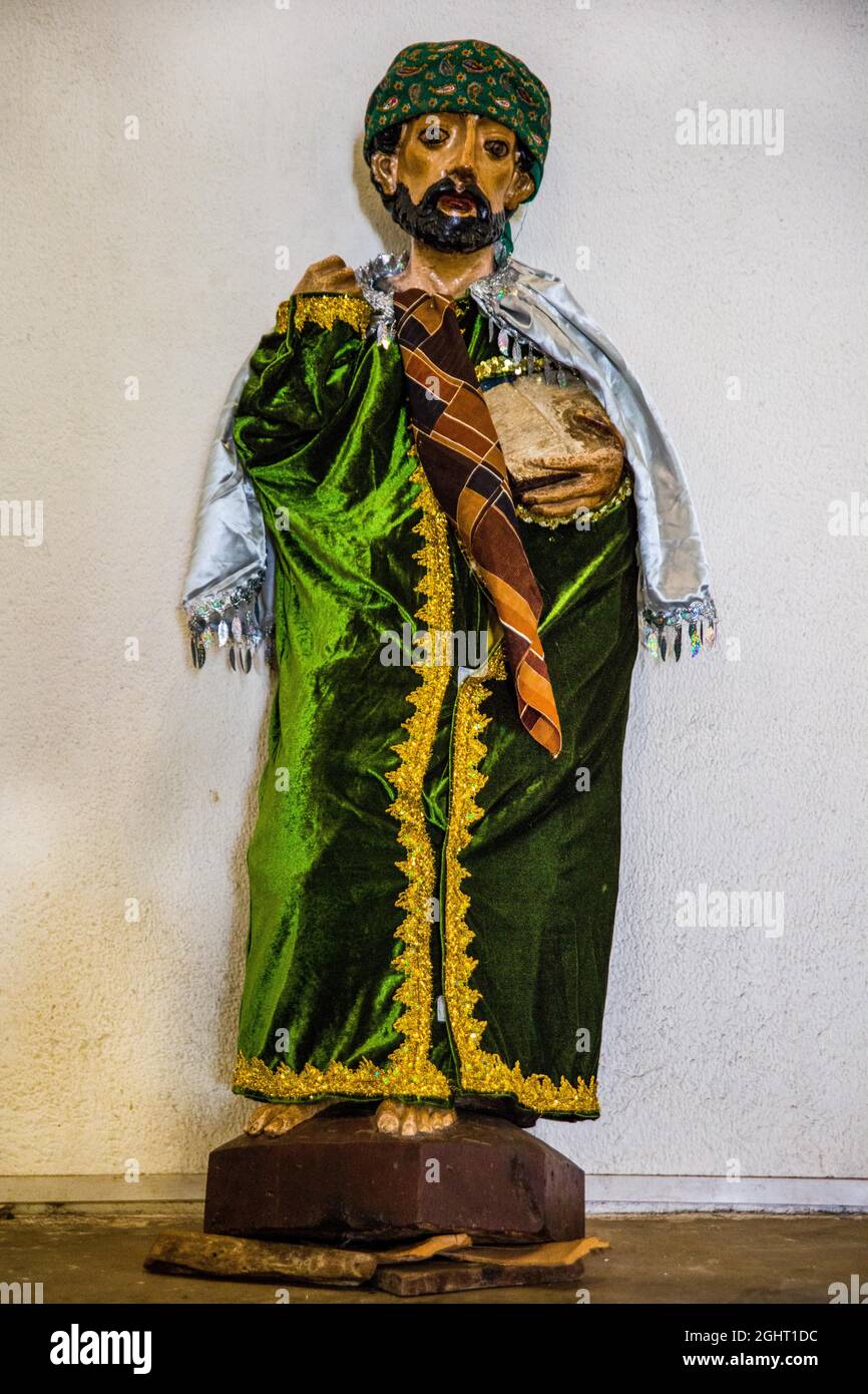 Wooden figures of the saints, dressed in traditional traditional costume, colonial-era Iglesia Parroquial Santiago Apostol of 1566, Santiago Stock Photo