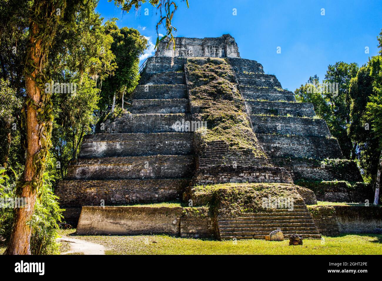 Temple 216, large pyramid on the east side of Plaza A on the East Acropolis, Yaxha, third largest ruined Mayan city, Yaxha, Guatemala Stock Photo
