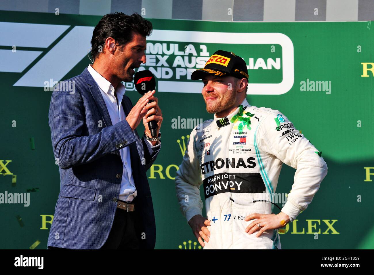 Race winner Valtteri Bottas (FIN) Mercedes AMG F1 with Mark Webber (AUS) Channel 4 Presenter on the podiium