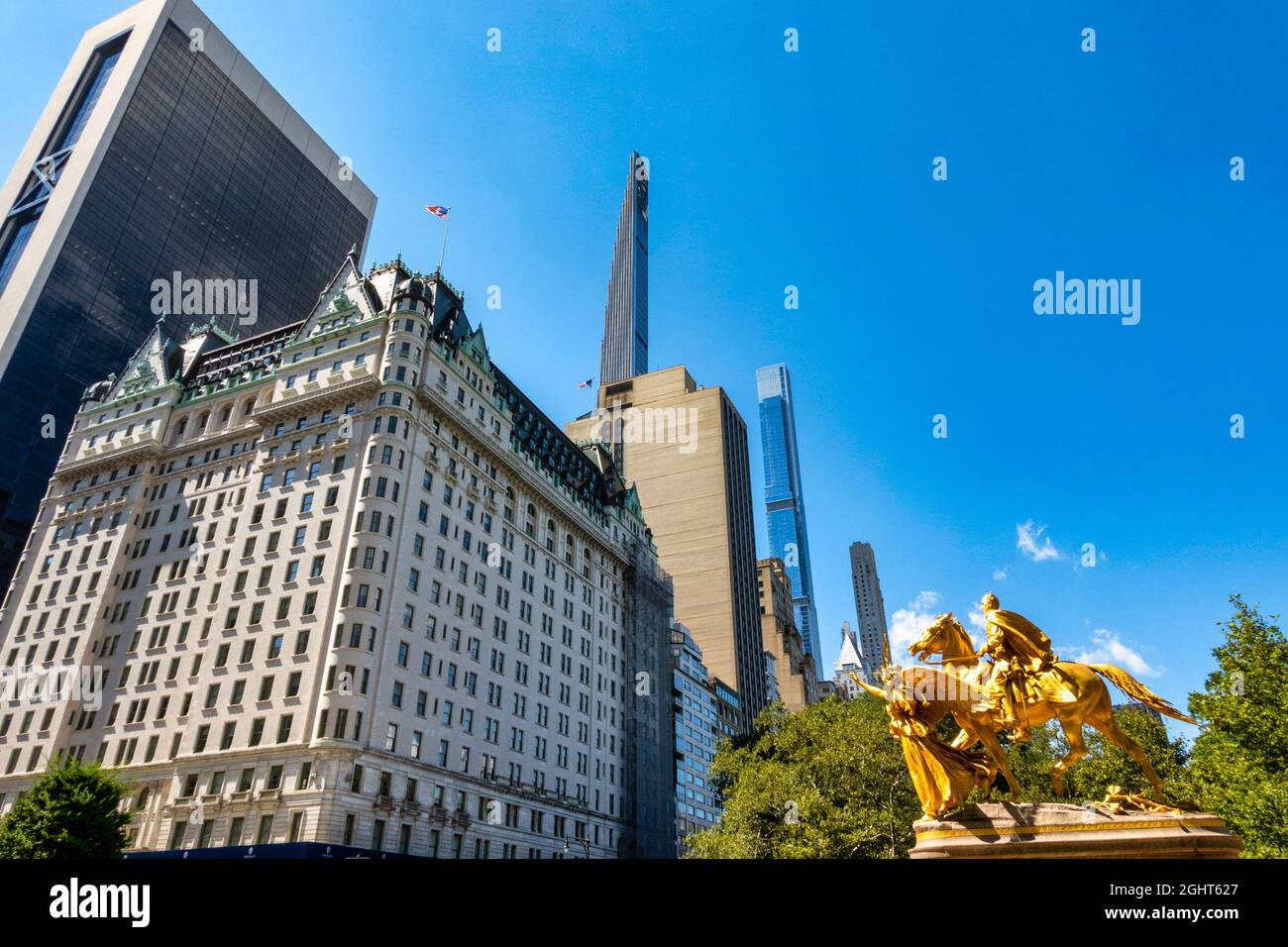 The Statue of General Sherman in Grand Army Plaza is dwarfed by the Super Tall buildings south of Central Park, New York City, USA Stock Photo