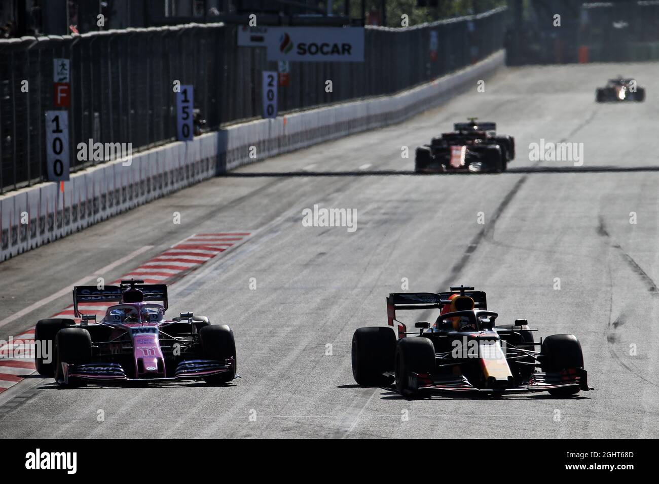 Sergio Perez (MEX) Racing Point F1 Team RP19 and Max Verstappen (NLD ...