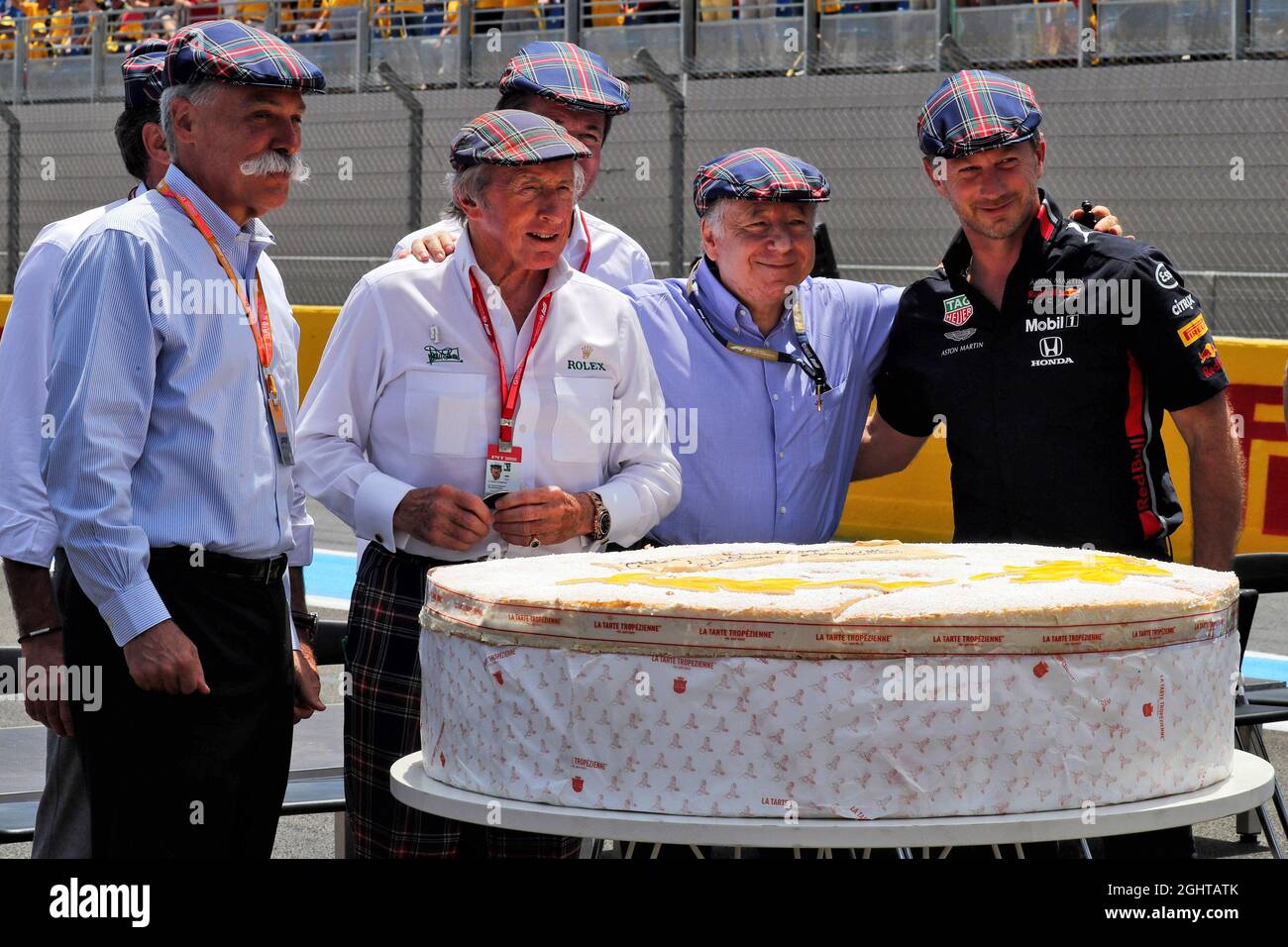 (L to R): Chase Carey (USA) Formula One Group Chairman with Jackie Stewart (GBR), celebrating his 80th birthday; Jean Todt (FRA) FIA President; and Christian Horner (GBR) Red Bull Racing Team Principal.  23.06.2019. Formula 1 World Championship, Rd 8, French Grand Prix, Paul Ricard, France, Race Day.  Photo credit should read: XPB/Press Association Images. Stock Photo