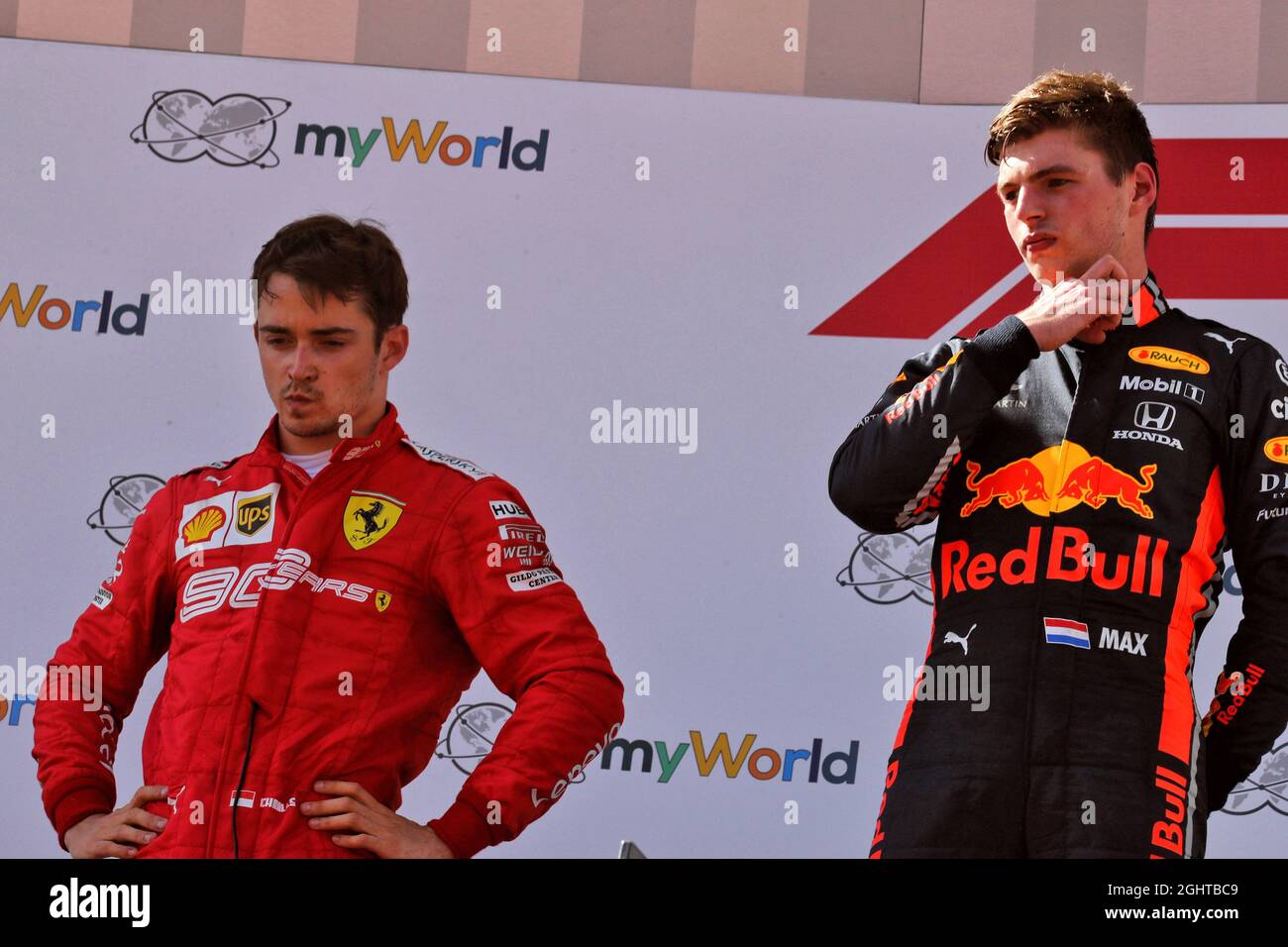The podium (L to R): second placed Charles Leclerc (MON The podium (L to R): second placed Charles Leclerc (MON