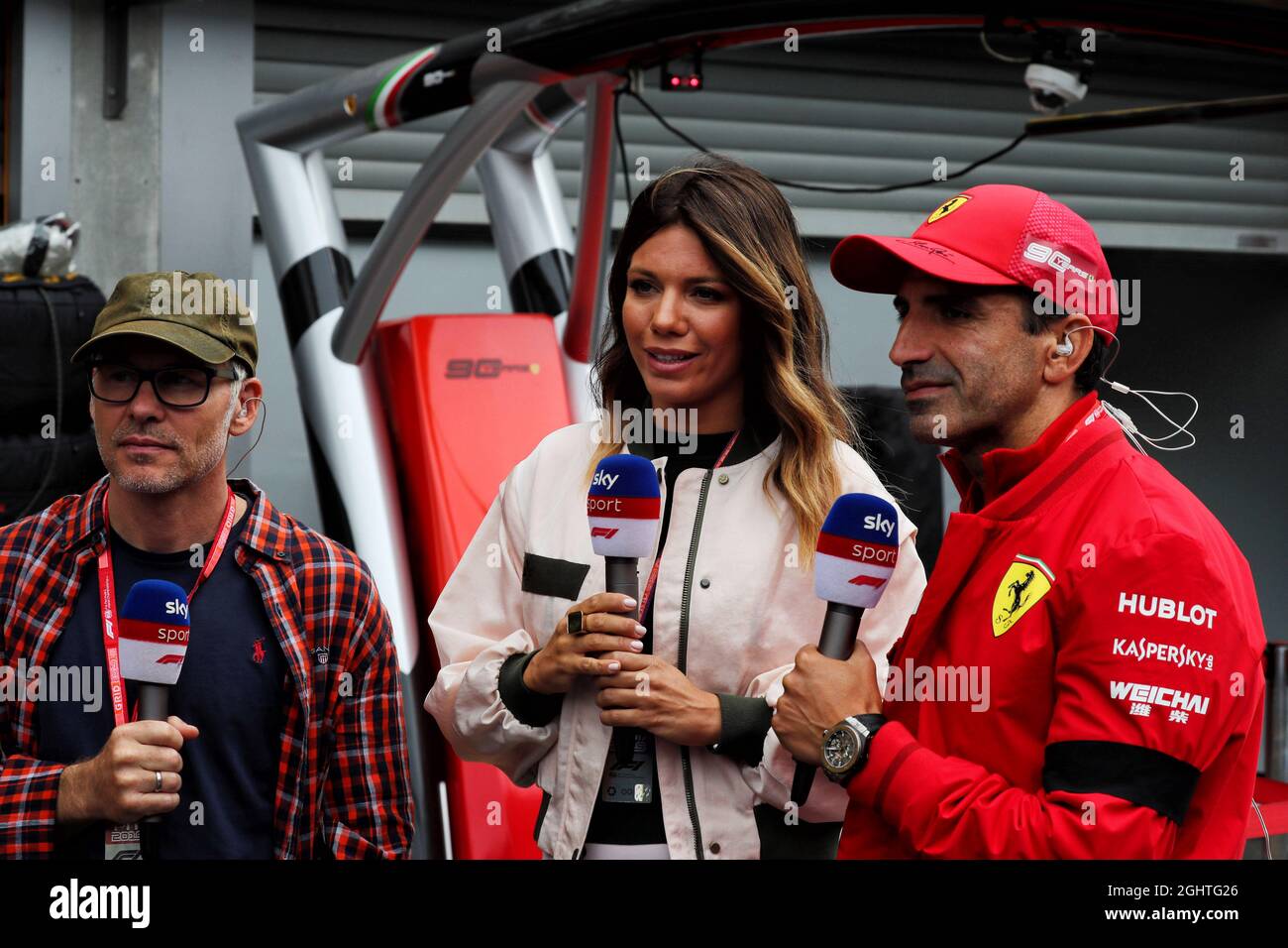 L to R) Jacques Villeneuve (CDN) with Federica Masolin (ITA) Sky F1 Italia Presenter and Marc Gene (ESP) Ferrari Test Driver