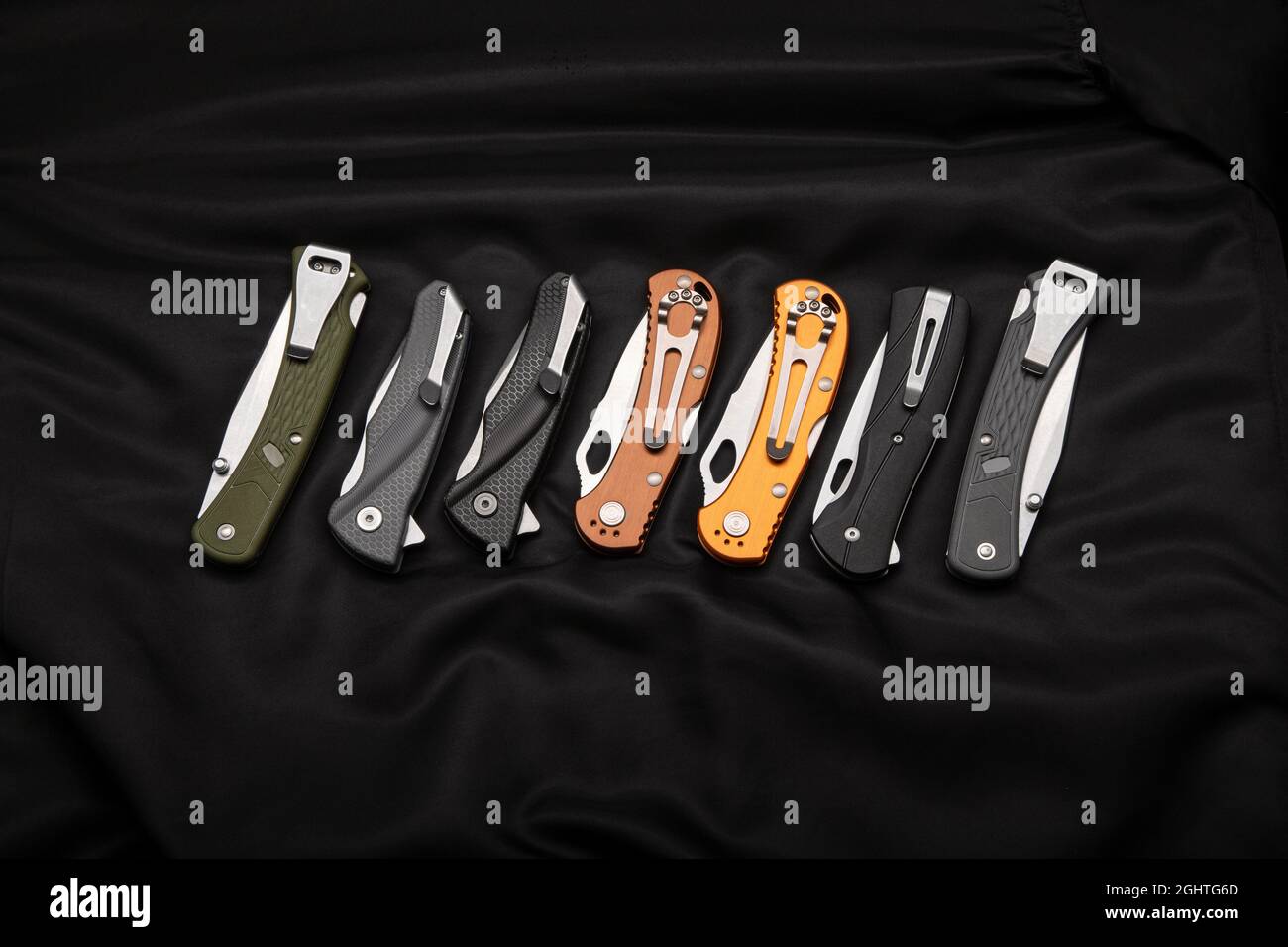 A Variety Of Folding And Pocket Knives Lie On Khaki Fabric A Versatile  Pocket Tool And Selfdefense Tool Stock Photo - Download Image Now - iStock