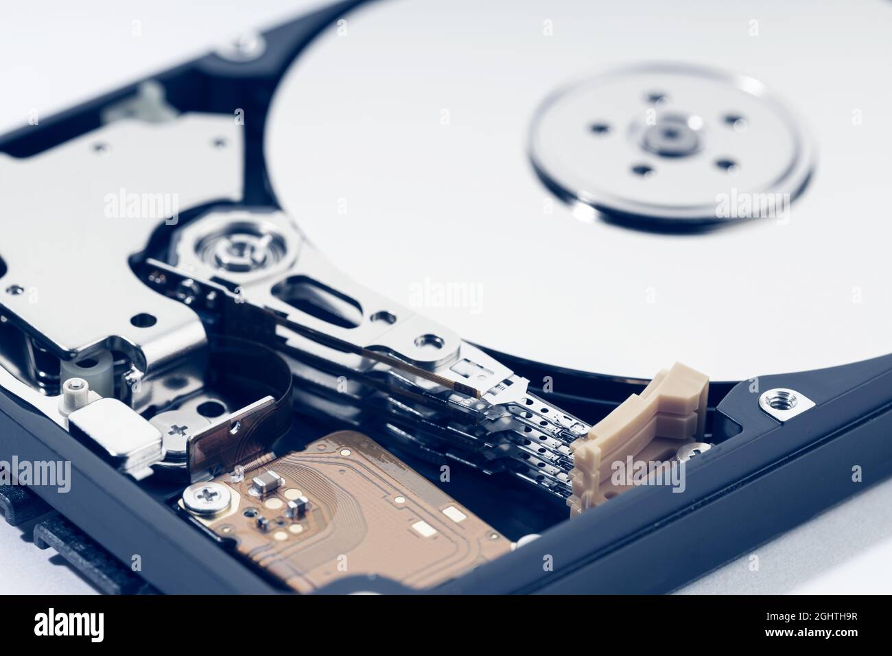 Close up of open Hard disk drive HDD. Computer hardware data storage Stock Photo