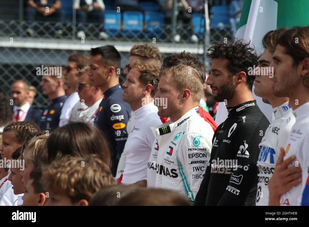Valtteri Bottas (FIN) Mercedes AMG F1 and Daniel Ricciardo (AUS) Renault F1 Team as the grid observes the national anthem.  08.09.2019. Formula 1 World Championship, Rd 14, Italian Grand Prix, Monza, Italy, Race Day.  Photo credit should read: XPB/Press Association Images. Stock Photo
