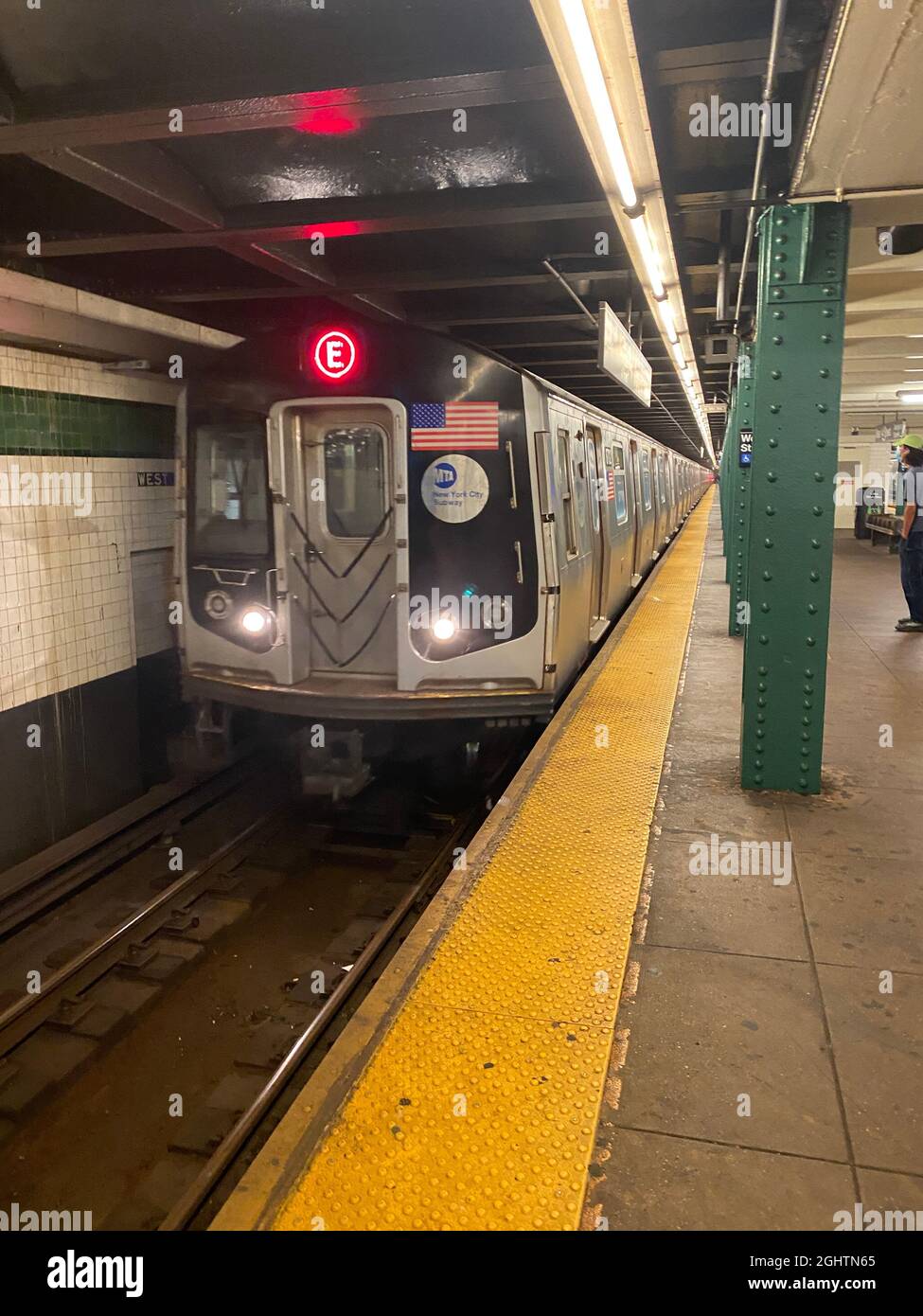 E train enters the West 4th Street Station in Greenwich Village, New