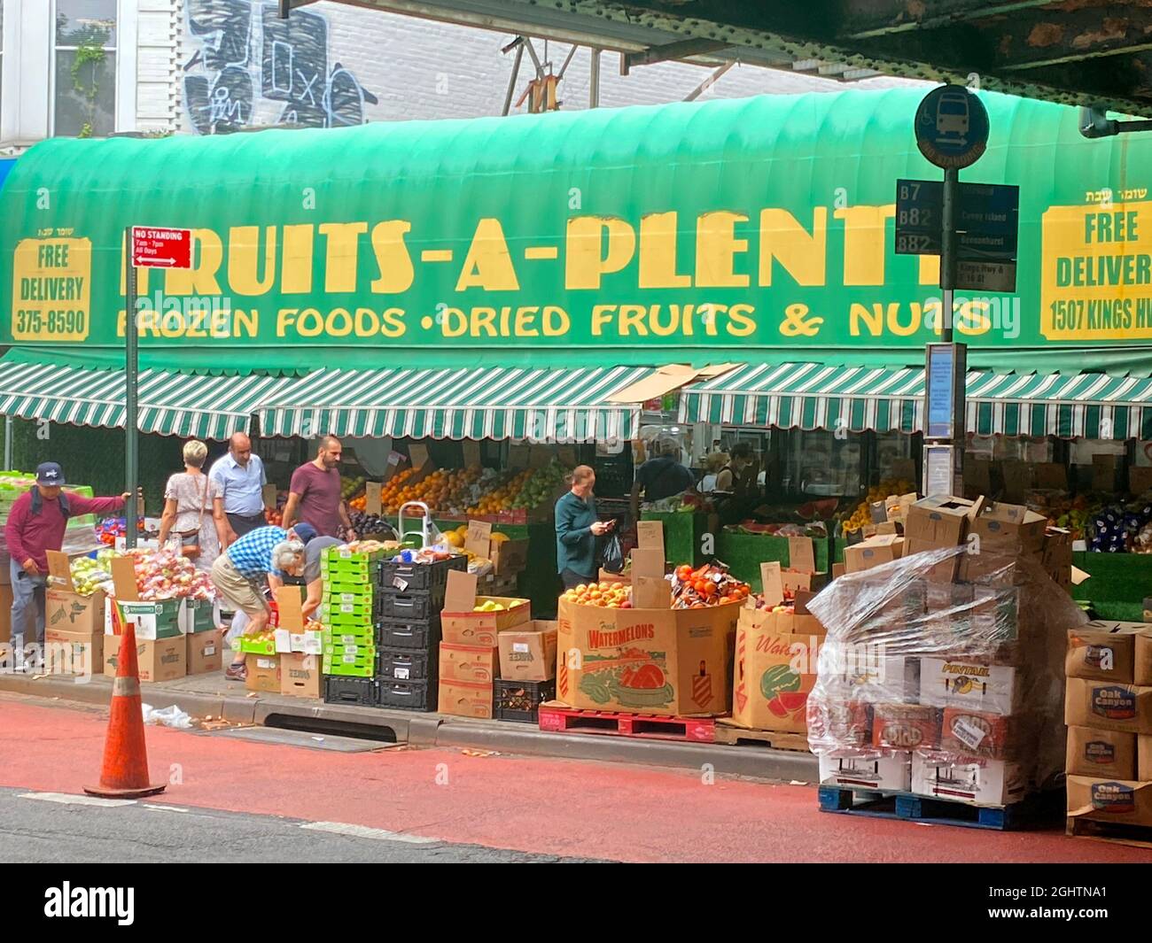 Produce market on Kings Highway underneath the elevated Q train in the