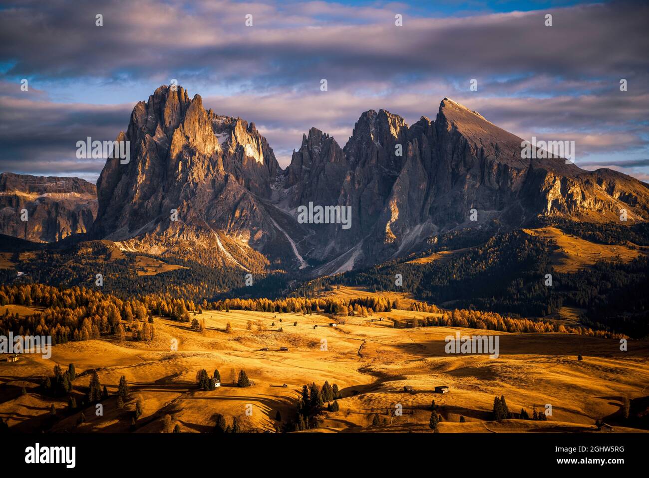 Sassolungo mountain range above Alpe di Siusi plateau, Val Gardena, South Tyrol, Italy Stock Photo