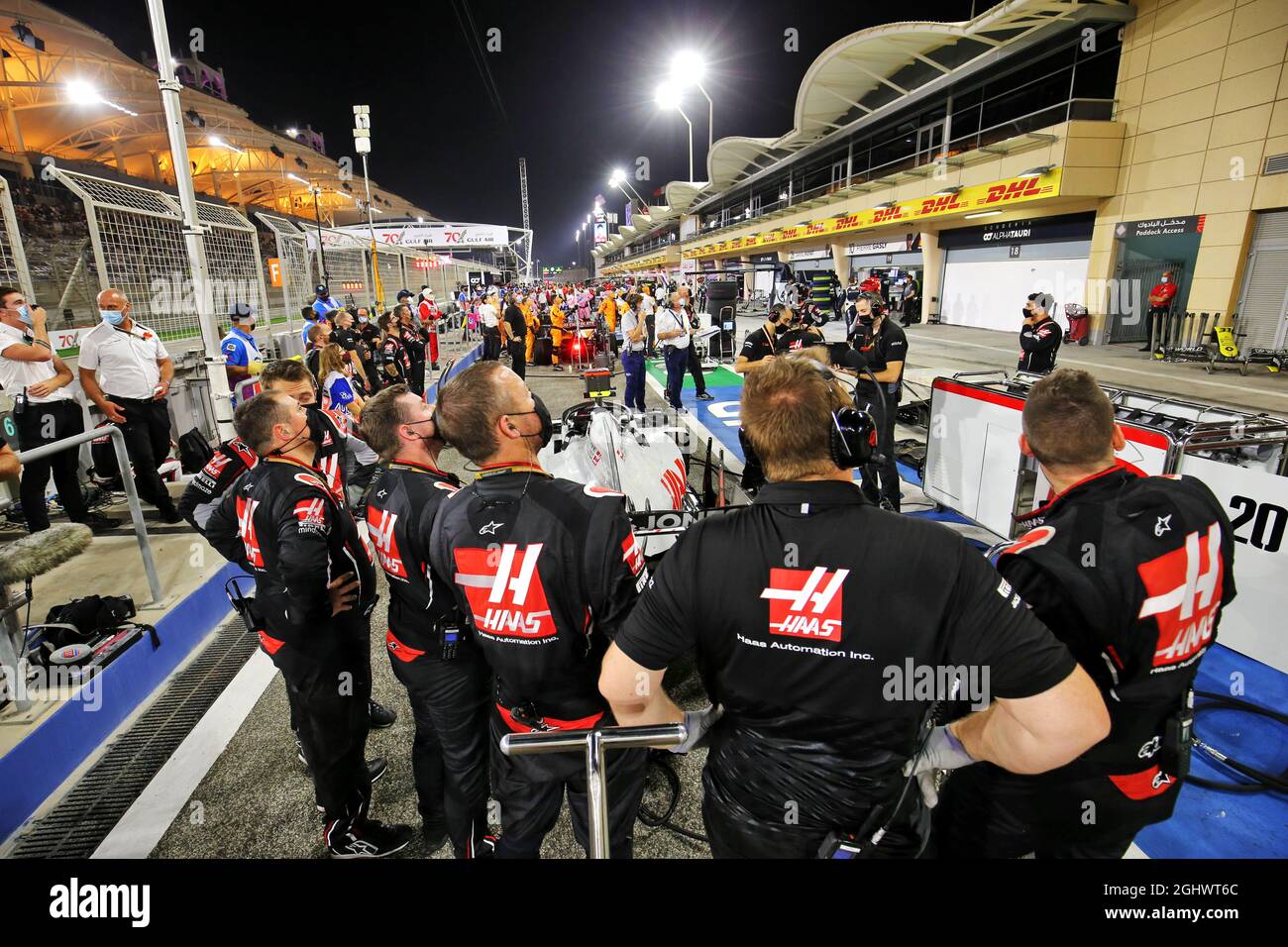 Haas F1 Team mechanics in the pits while the race is stopped watch a replay of the crash suffered by Romain Grosjean (FRA) Haas F1 Team at the start of the race.