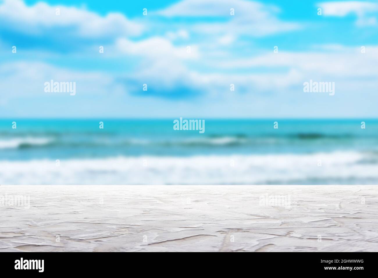 white textured surface on blur sea wave background Stock Photo