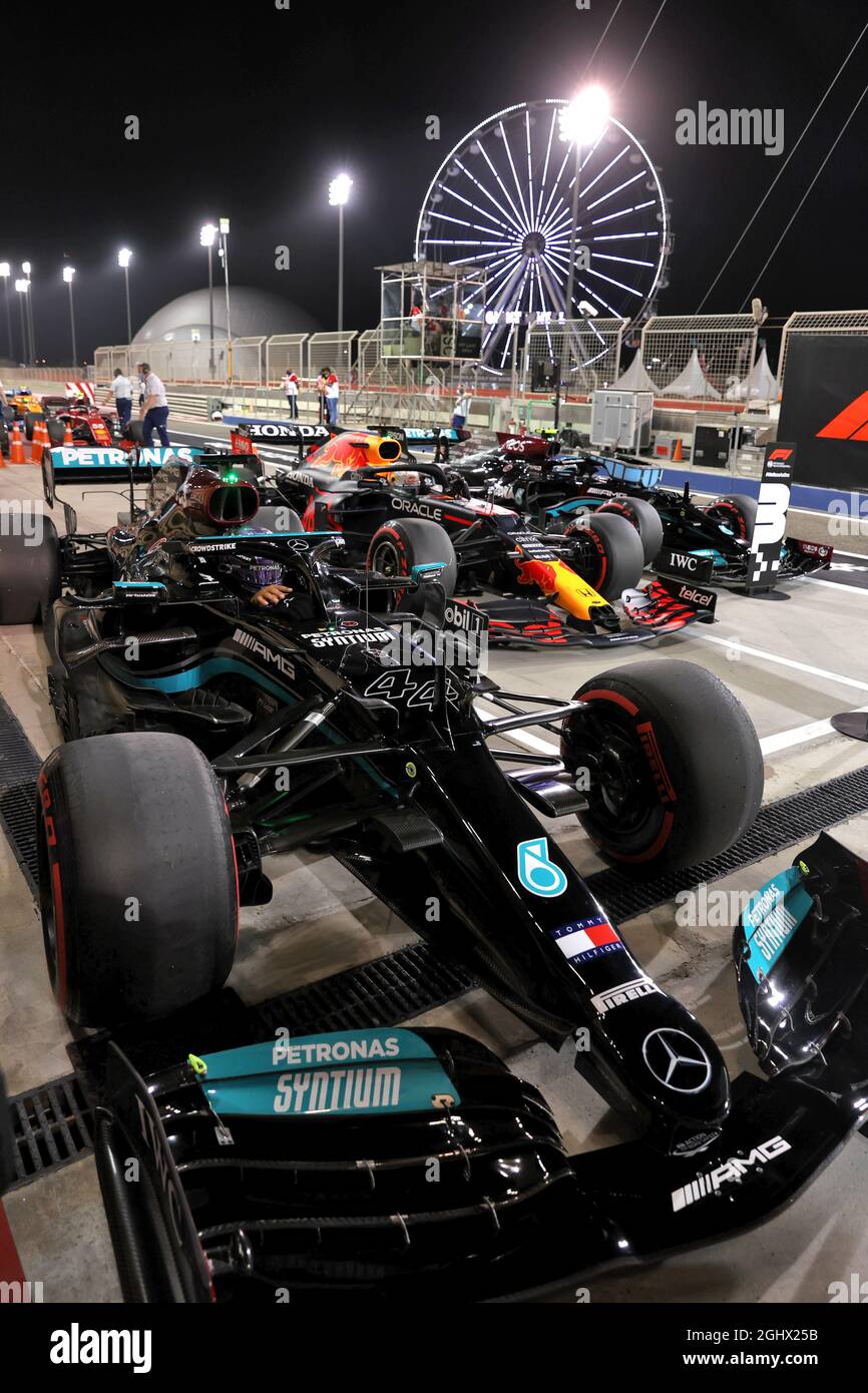 Lewis Hamilton (GBR) Mercedes AMG F1 W12; Max Verstappen (NLD) Red Bull Racing RB16B; and Valtteri Bottas (FIN) Mercedes AMG F1 W12, in qualifying parc ferme.  27.03.2021. Formula 1 World Championship, Rd 1, Bahrain Grand Prix, Sakhir, Bahrain, Qualifying Day.  Photo credit should read: XPB/Press Association Images. Stock Photo