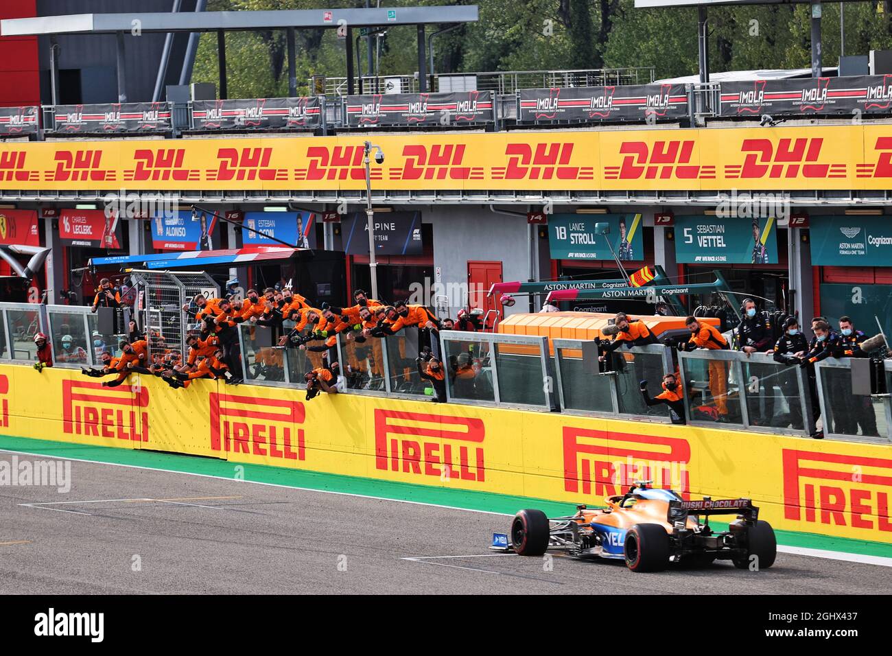 Lando Norris (GBR) McLaren MCL35M celebrates his third position as he passes his team at the end of the race.  18.04.2021. Formula 1 World Championship, Rd 2, Emilia Romagna Grand Prix, Imola, Italy, Race Day.  Photo credit should read: XPB/Press Association Images. Stock Photo
