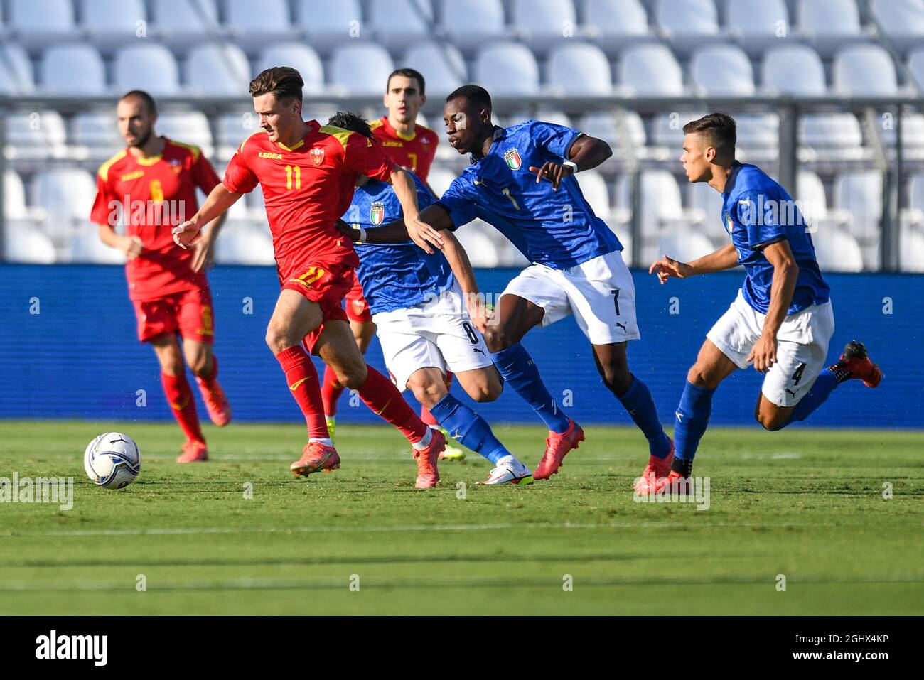 Omar Sijaric (Montenegro) in action and Kelvin Yeboah (Italia) during