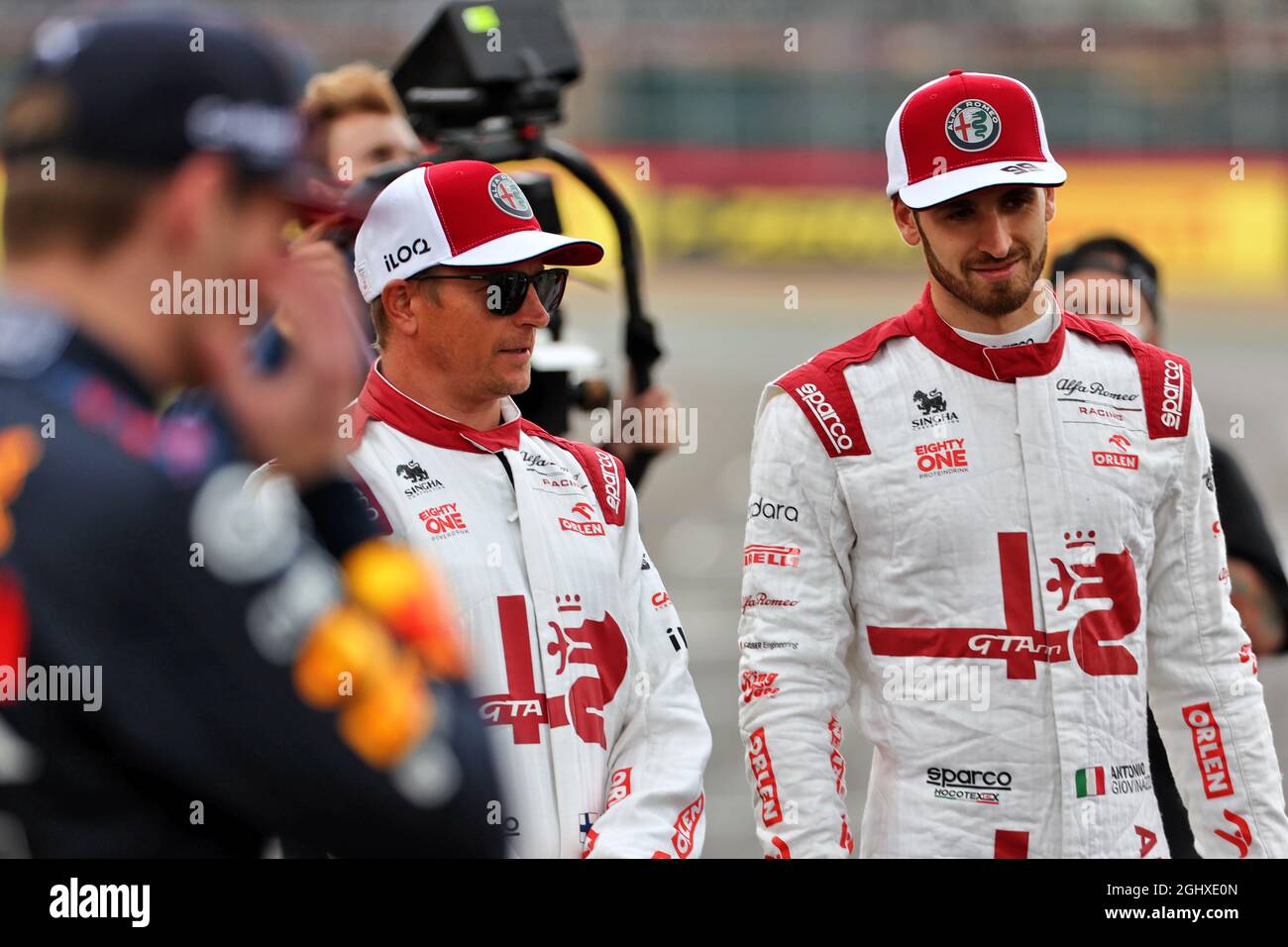 (L to R): Kimi Raikkonen (FIN) Alfa Romeo Racing with team mate Antonio ...