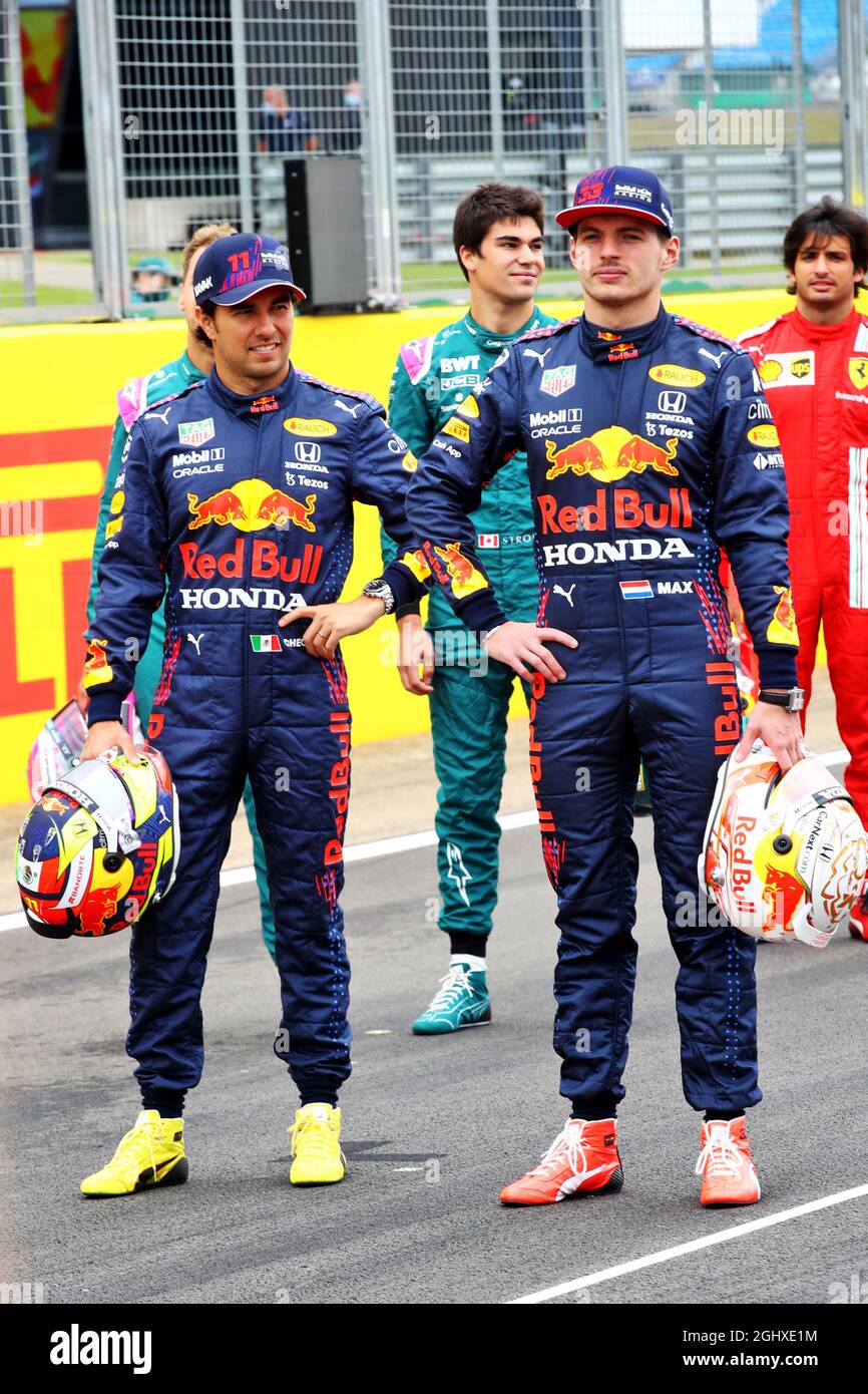 (L to R): Sergio Perez (MEX) Red Bull Racing and team mate Max Verstappen (NLD) Red Bull Racing - 2022 Car Launch.  15.07.2021. Formula 1 World Championship, Rd 10, British Grand Prix, Silverstone, England, Preparation Day.  Photo credit should read: XPB/Press Association Images. Stock Photo