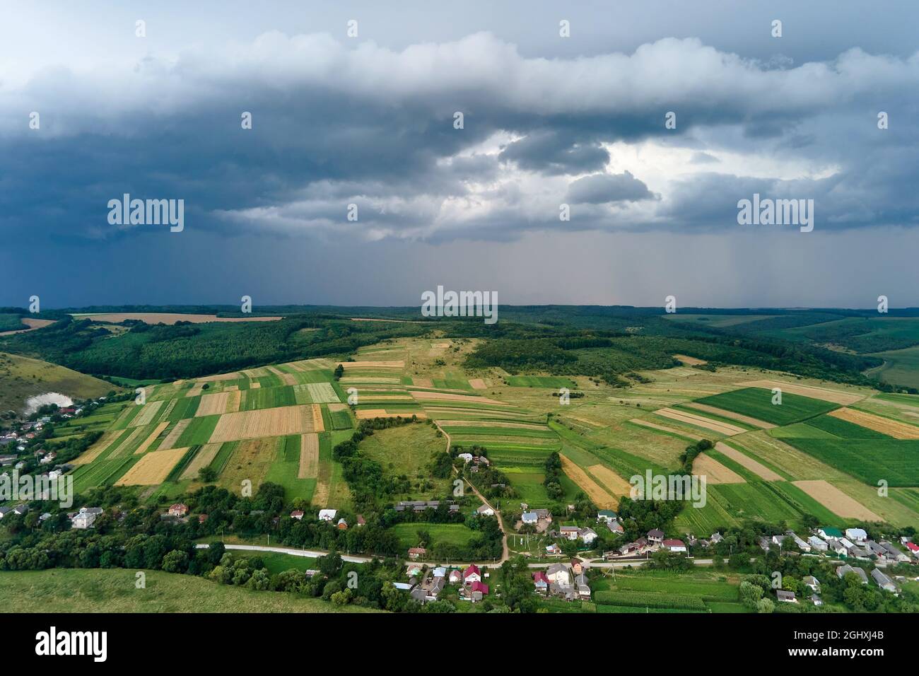 Landscape of dark clouds forming on stormy sky during thunderstorm over ...