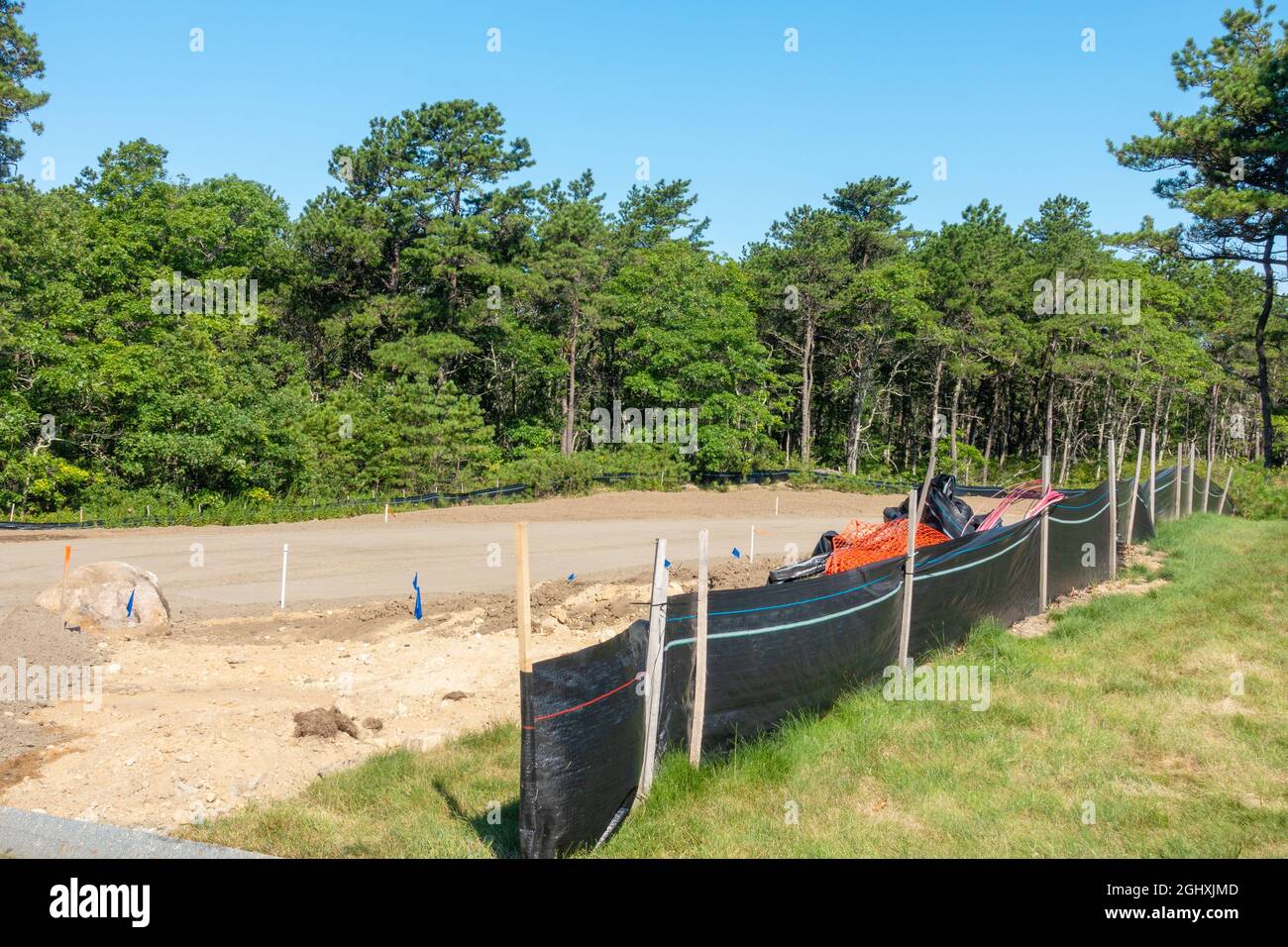Silt Control Fencing alongside new road construction for erosion Stock Photo
