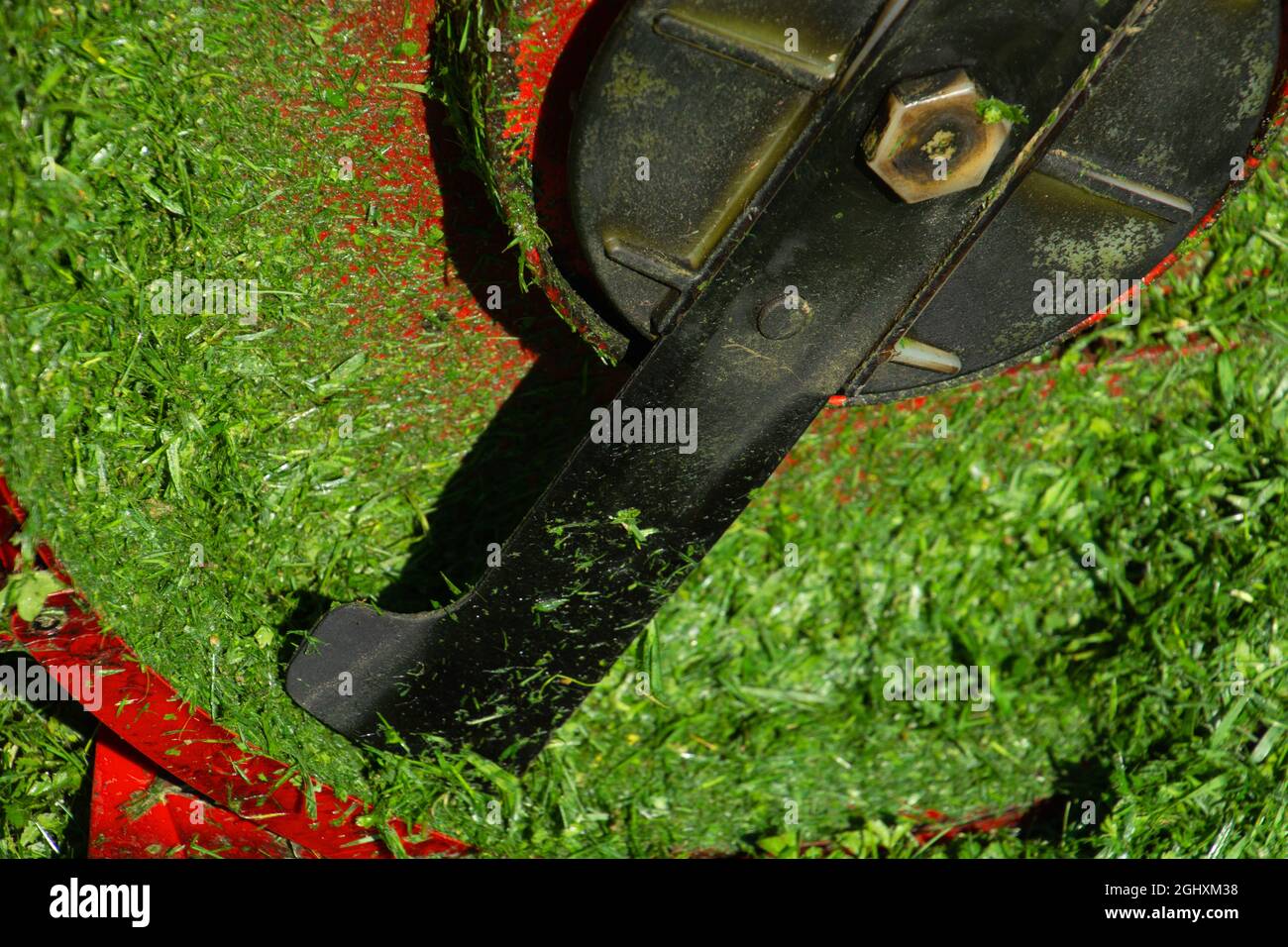 mower from underneath with cutting grass before cleaning after using