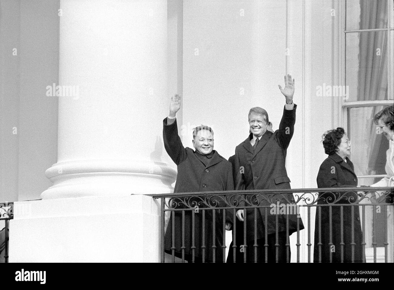 Deng Xiaoping, Vice Premier of China and U.S. President Jimmy Carter waving from Balcony at White House, First Ladies Zhuo Lin and Rosalynn Carter on right, Washington, D.C., USA, Warren K. Leffler, Thomas J. O'Halloran, Marion S. Trikosko, January 29, 1979 Stock Photo