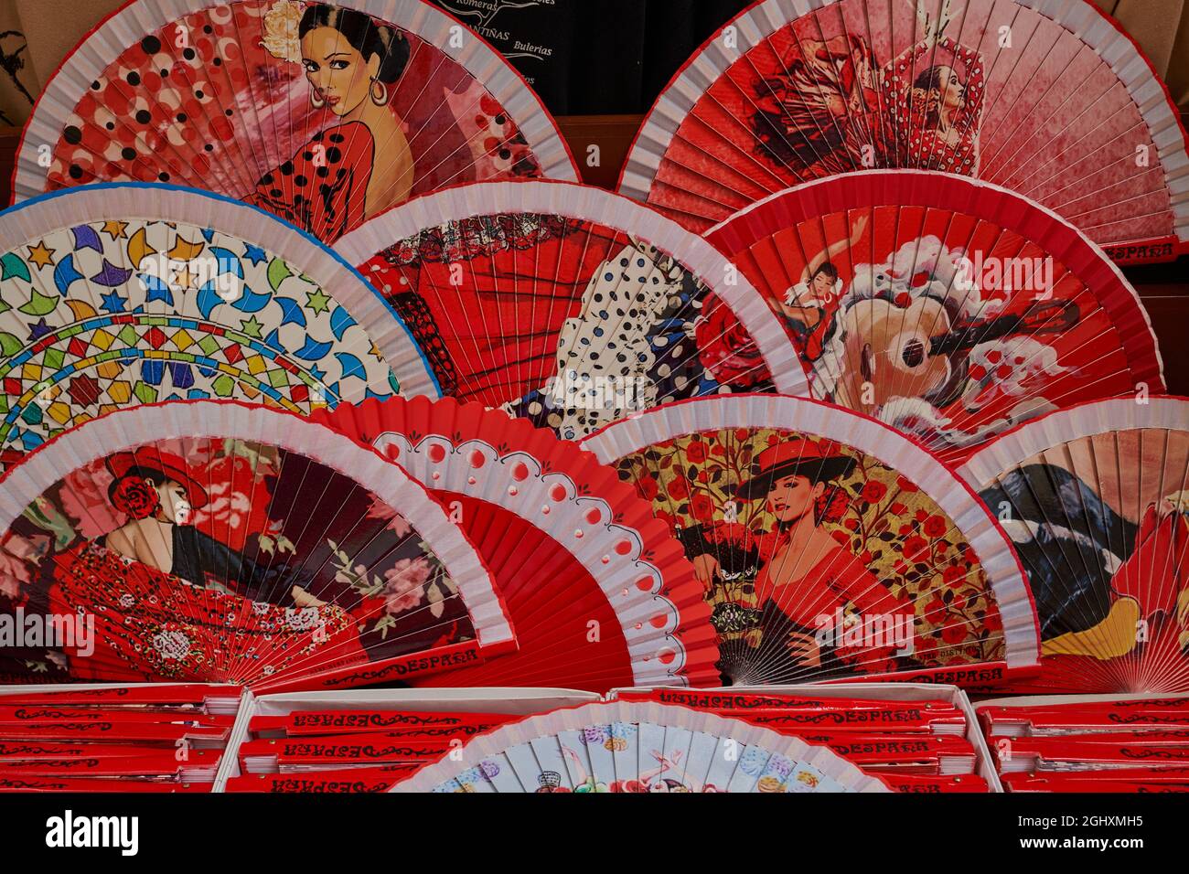 Andalusian colored fans on display in Granada Stock Photo