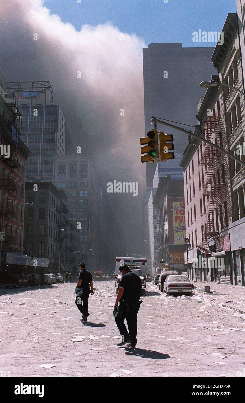 https://c8.alamy.com/comp/2GHXP6K/new-york-usa-11th-sep-2001-rescue-crews-work-next-to-the-wtc-after-its-been-hit-by-a-terrorist-attack-sept-11-2001-in-manhattan-new-york-city-ny-two-commercial-planes-were-hijacked-and-crashed-into-the-twin-towers-in-new-york-city-photo-by-gary-fabianosipa-usa-credit-sipa-usaalamy-live-news-2GHXP6K.jpg