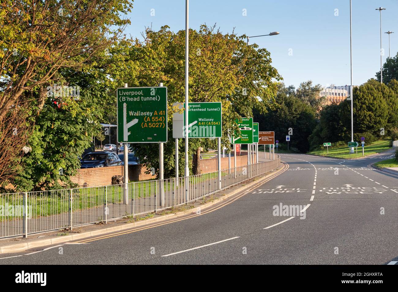 Birkenhead, UK: Signs on New Chester Road at junction between A41 and Liverpool Queensway tunnel under the river Mersey. Stock Photo