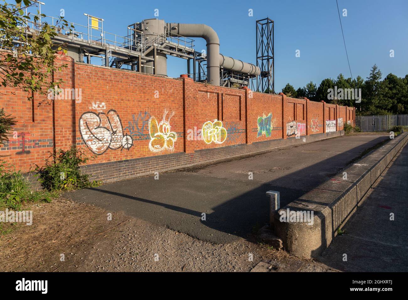 Birkenhead, UK: Wirral Circular trail by Waste Water Treatment works, former entrance to Morpeth Dock from River Mersey. Stock Photo