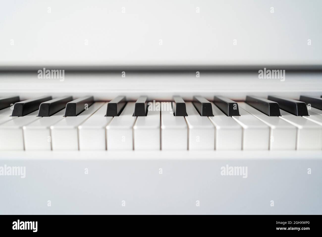 Digital piano looking over the keys. shallow depth of field. Classical  music on electronic digital piano. beautiful piano keys close up Stock  Photo - Alamy