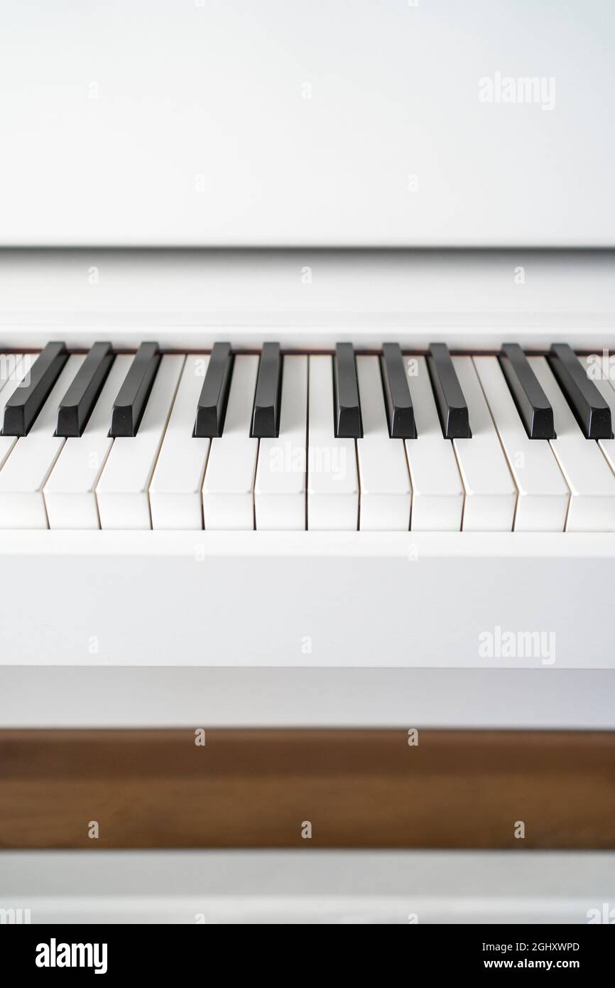 Piano keyboard. Classical music on electronic digital piano. Beautiful  white piano keys close up Stock Photo - Alamy