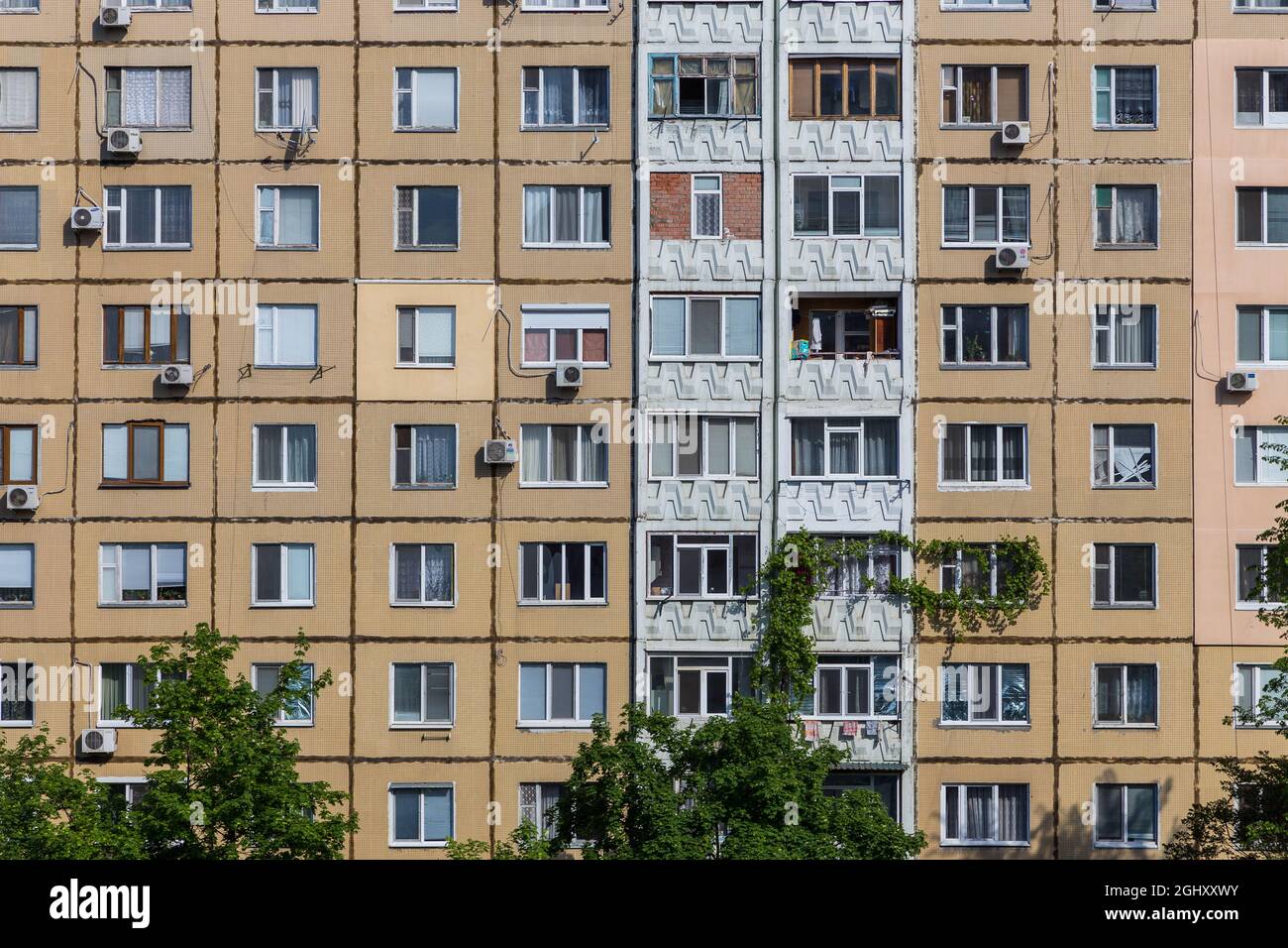 View of the facade of the apartment block. Big panel construction. Air