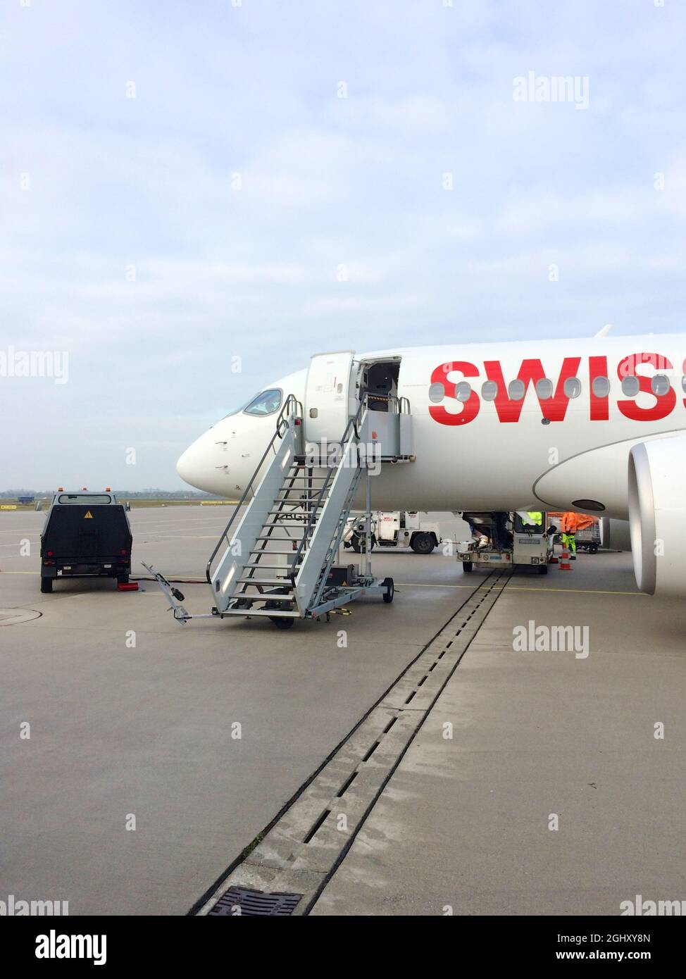 ZURICH, SWITZERLAND - 15 NOV 2017: Swiss Airbus A220 CSeries aircraft shortly before boarding in the morning Stock Photo