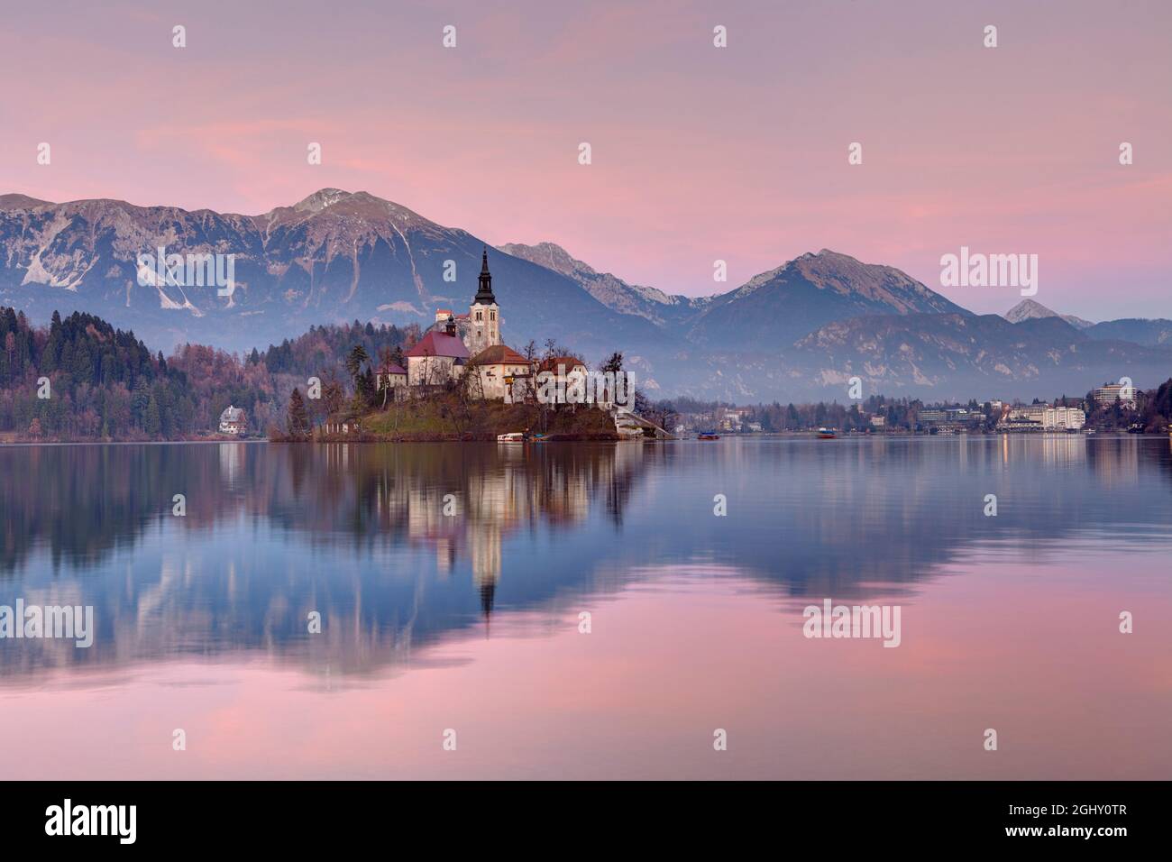View of Lake Bled and the Church of Mary the Queen, located on a small island in the middle of the lake, Bled, Slovenia Stock Photo
