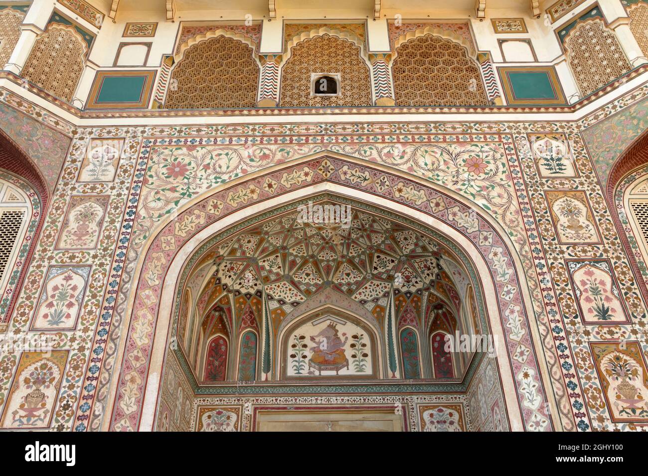 The decorations of Ganesh Pol at Amber Fort, Jaipur, India. Stock Photo