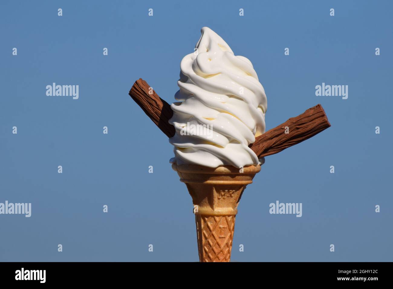 Soft whipped vanilla ice cream in a cone with chocolate flakes. Flake 99. My Whippy. UK. Stock Photo