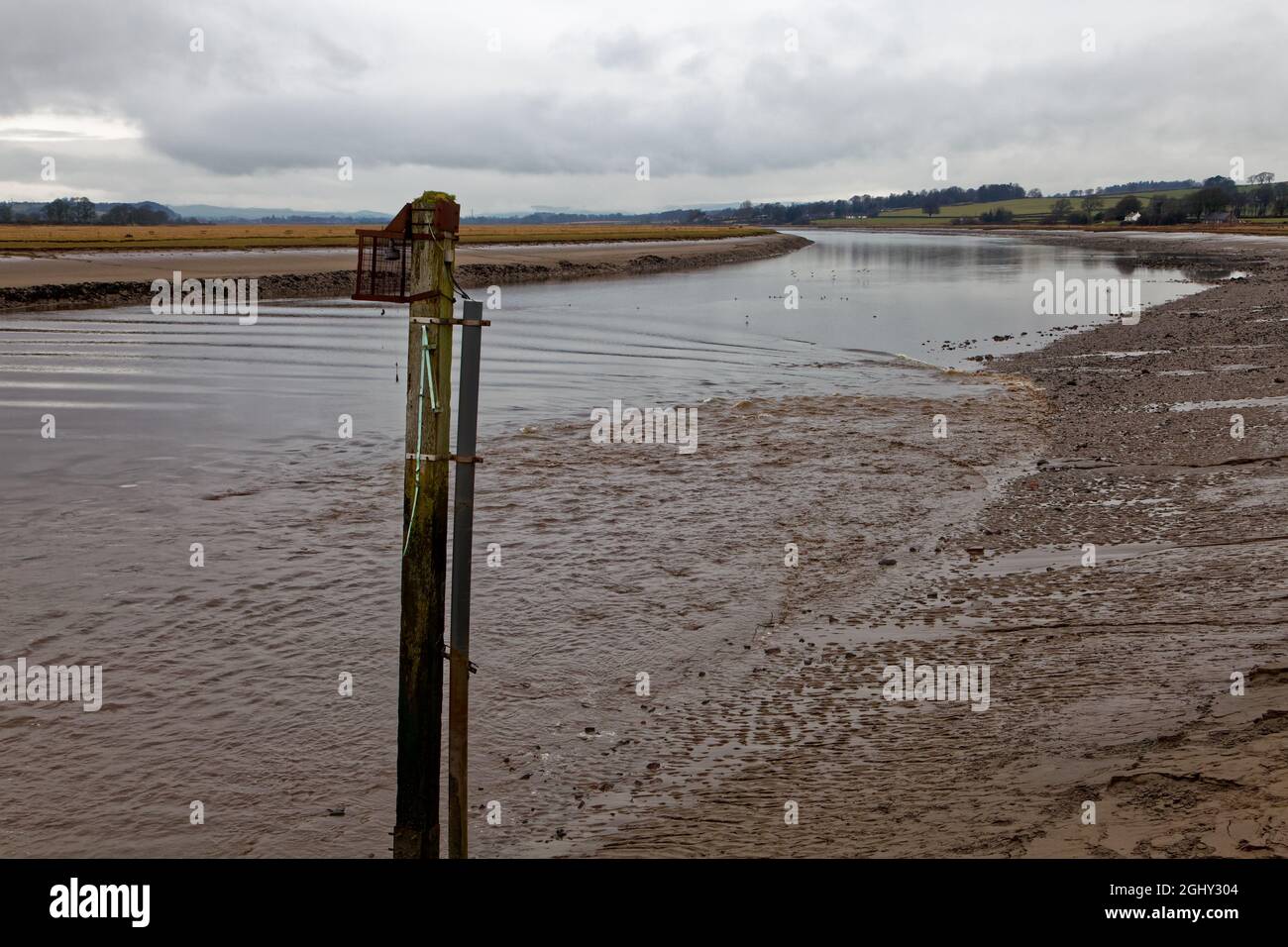The Nith Tidal Bore vewed from the pier at Glencaple Stock Photo