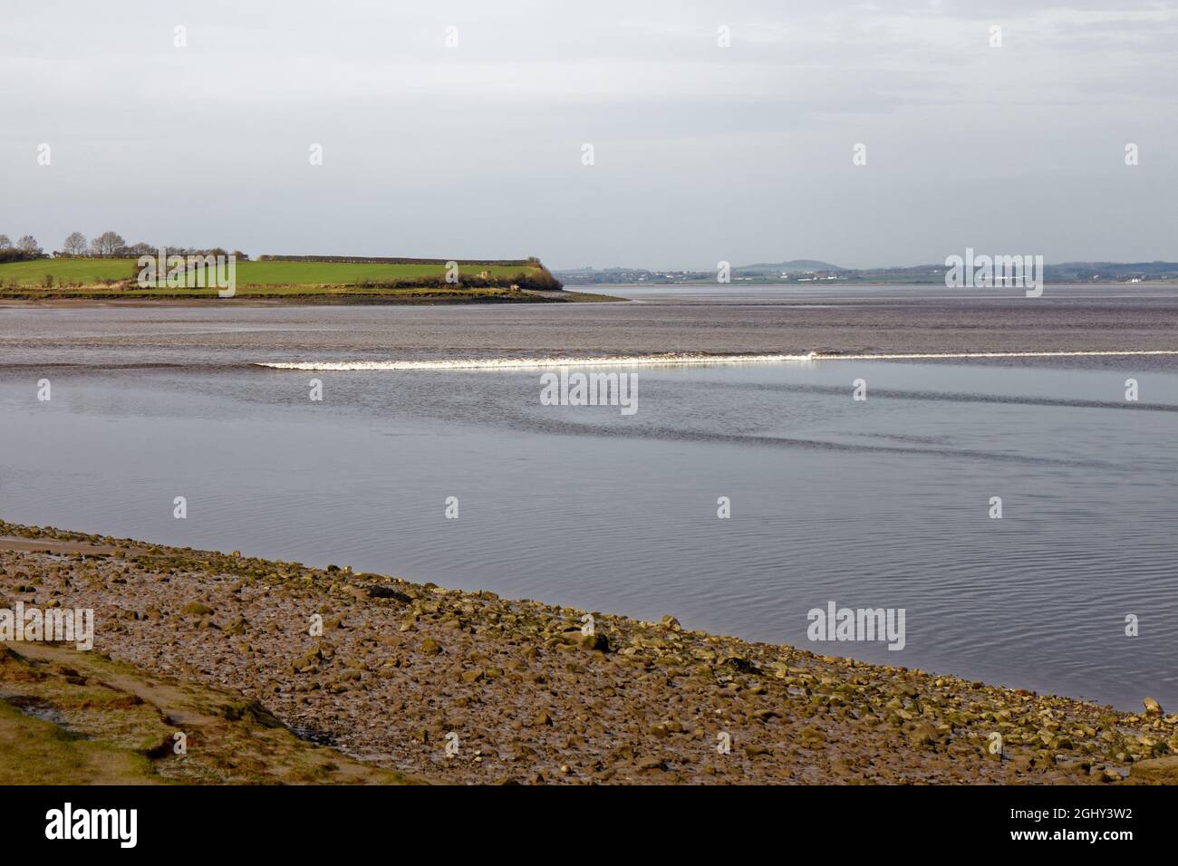 The Solway Bore approaching Drumburgh Stock Photo