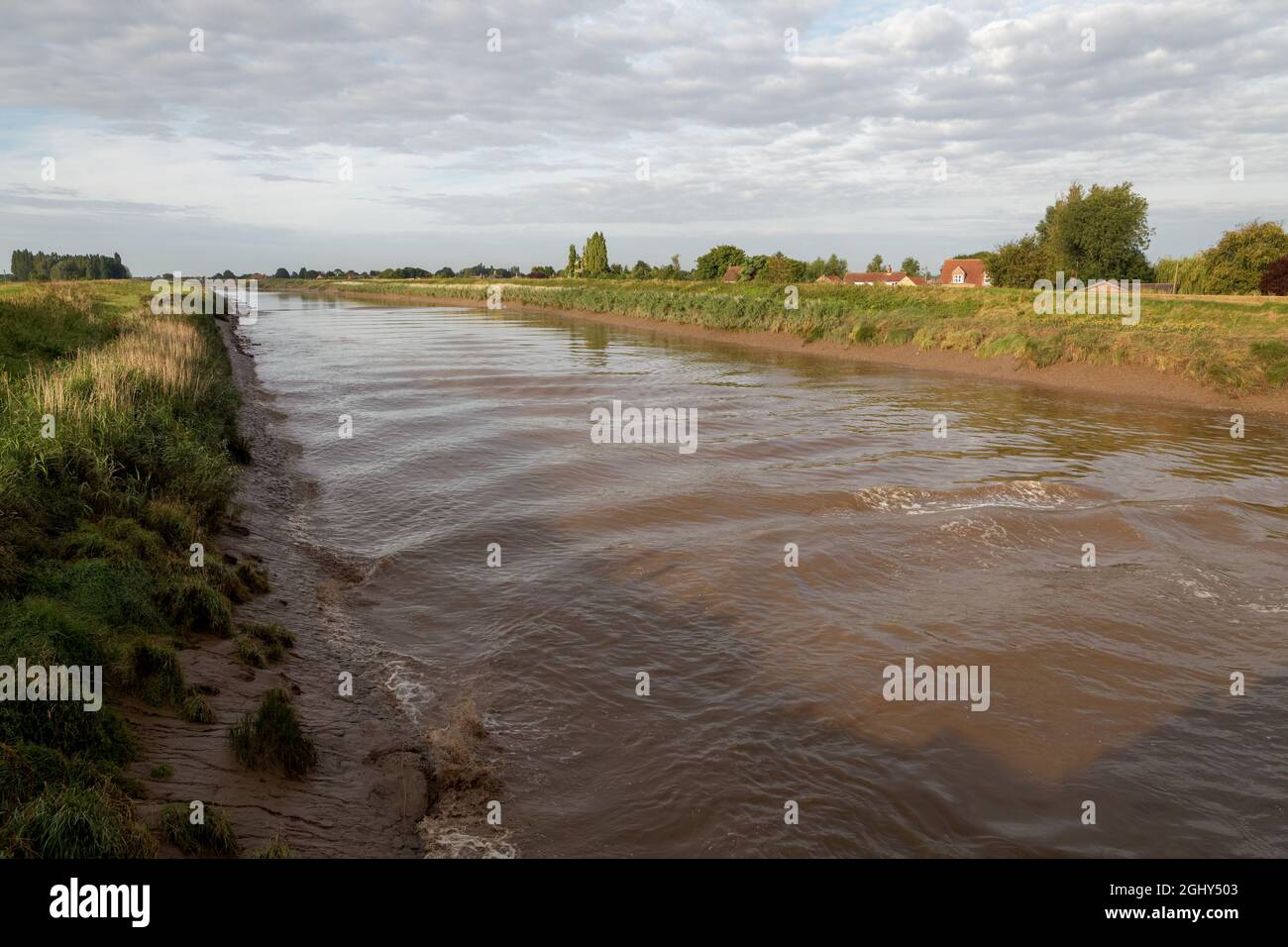The Wiggenhall Wave - a tidal bore or eagre - passing upstream from Wiggenhall St Mary Magdalen Stock Photo