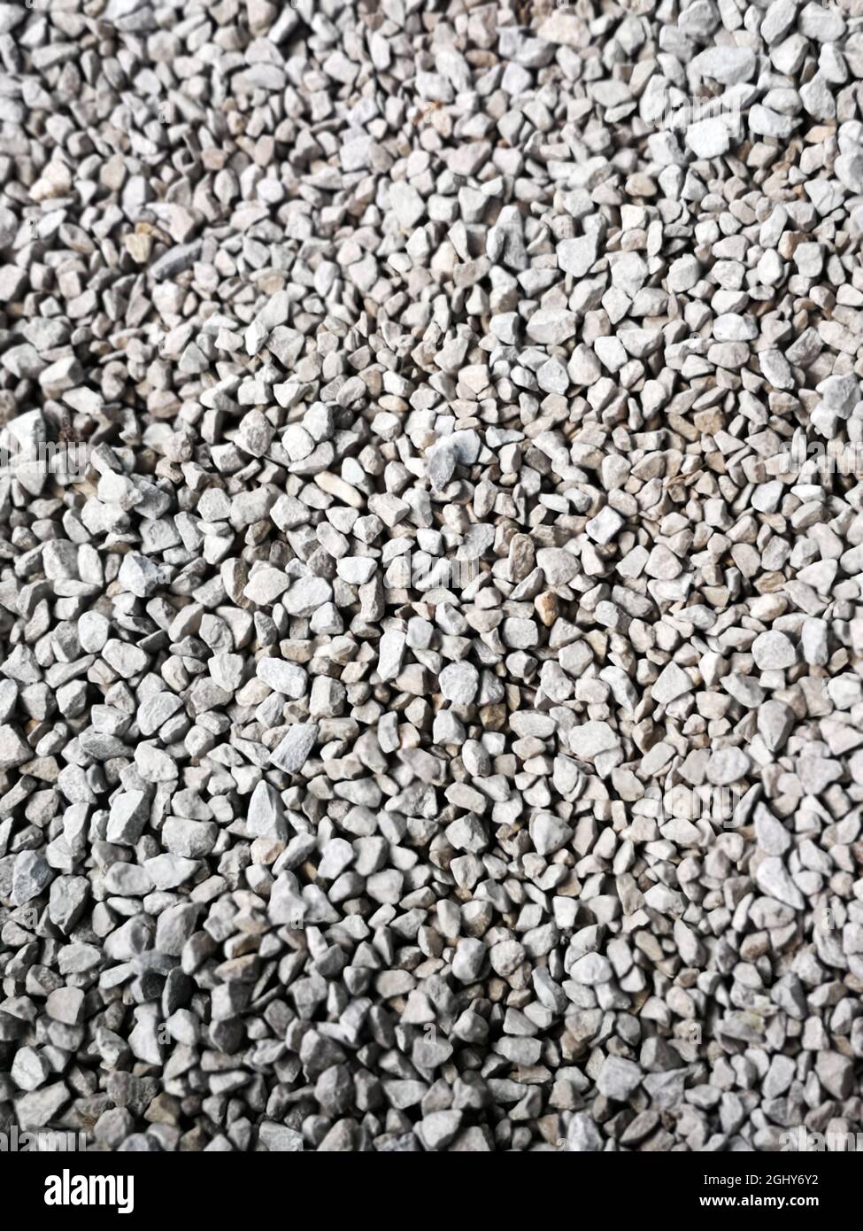 Grey gravel path ideal as a background Stock Photo