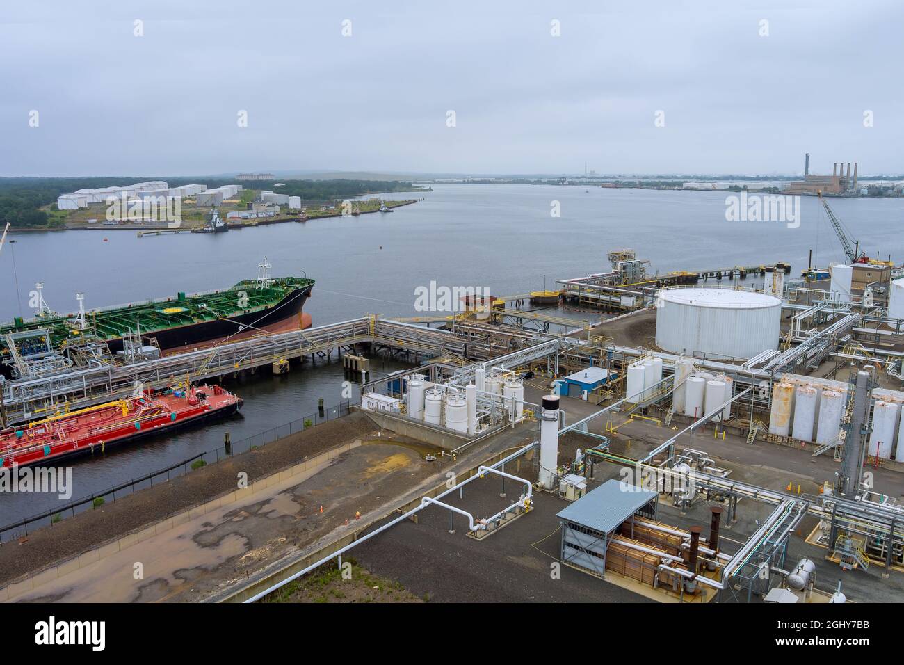 Aerial view tanker ship unloading in port of logistic import export business Stock Photo