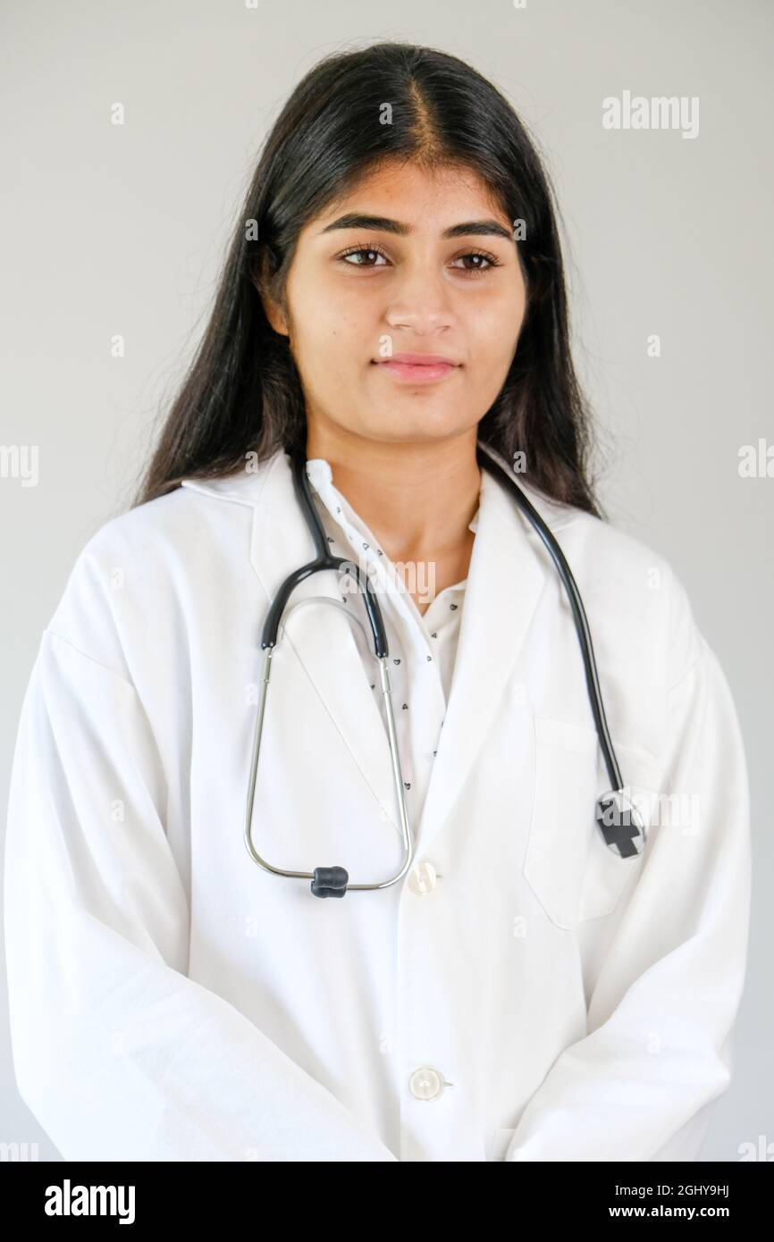 Young Indian female doctor wearing white coat and stethoscope Stock ...