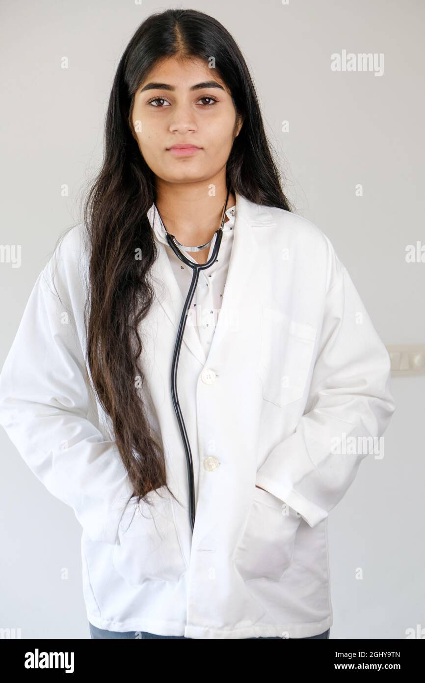 Young Indian female doctor wearing white coat and stethoscope Stock ...