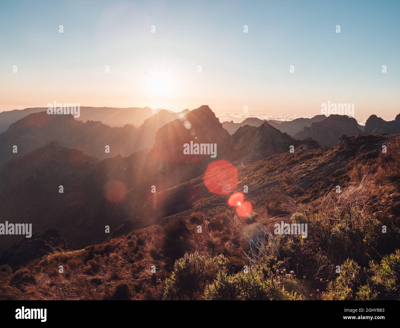 Aerial view to green mountains on a sunny day Stock Photo - Alamy