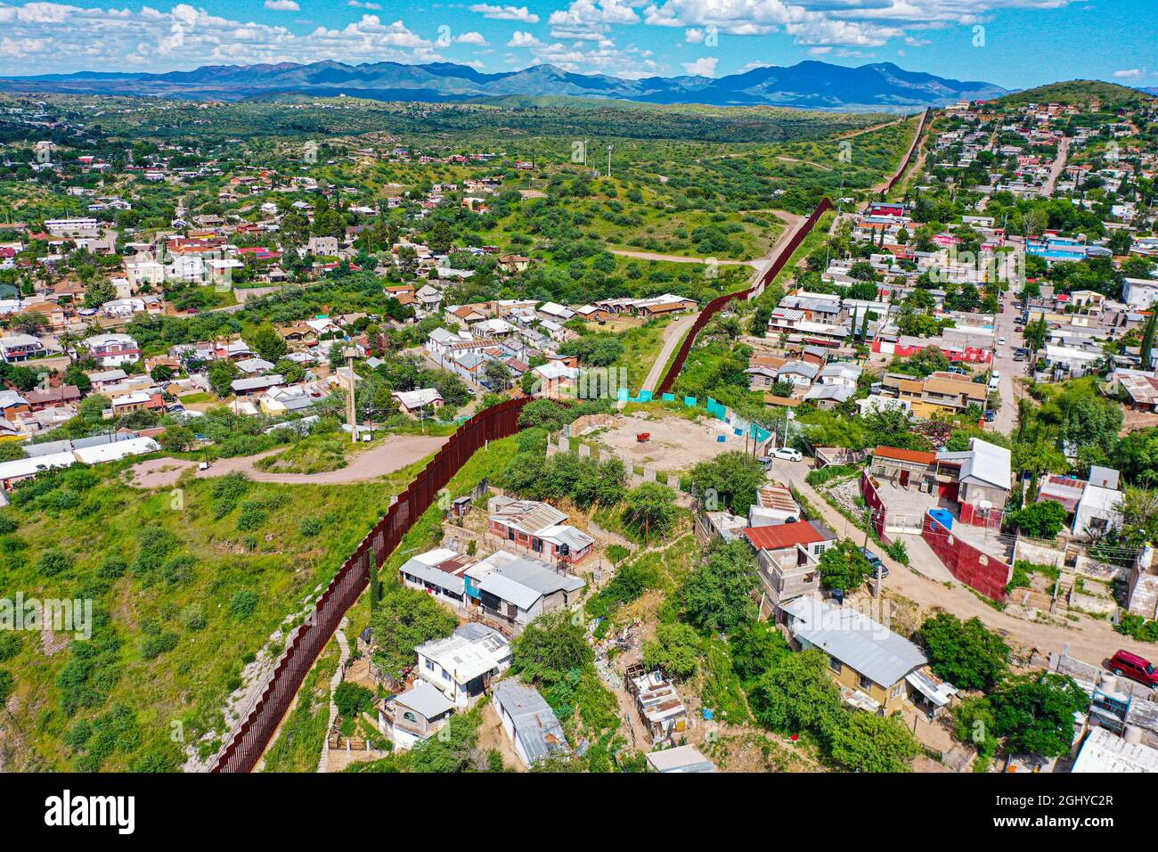 Aerial view of the border wall in Nogales Sonora (R) in Mexico and ...