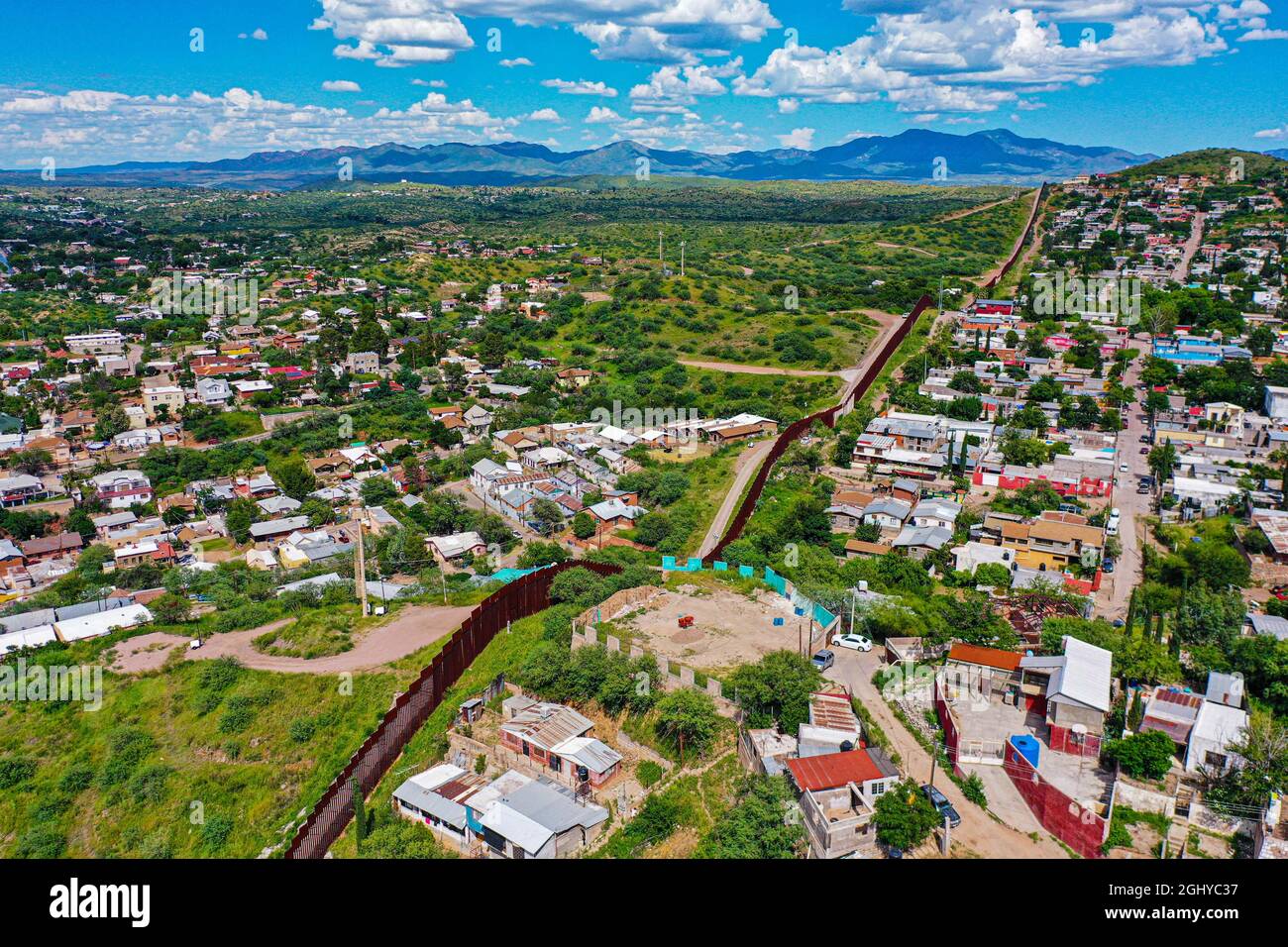 Aerial view of the border wall in Nogales Sonora (R) in Mexico and ...