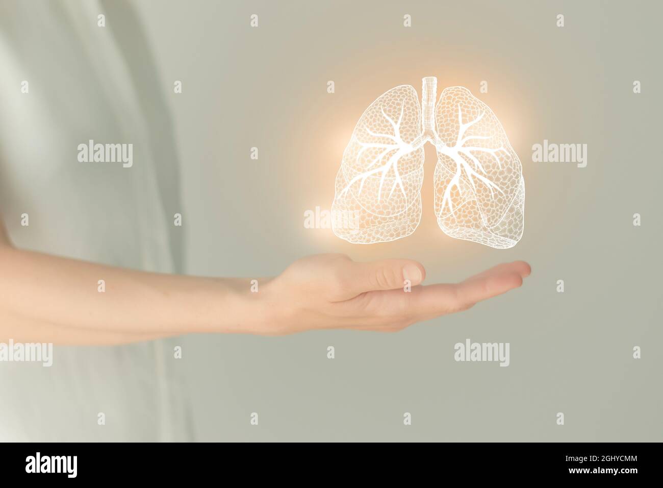 Unrecognizable female patient in white clothes, highlighted handrawn lungs. Human respiratory system issues concept. Stock Photo