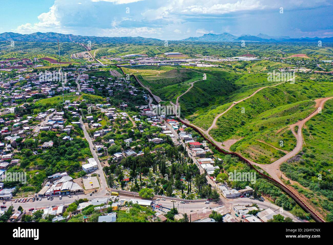 Aerial view of the border wall in Nogales Sonora (L) in Mexico and ...
