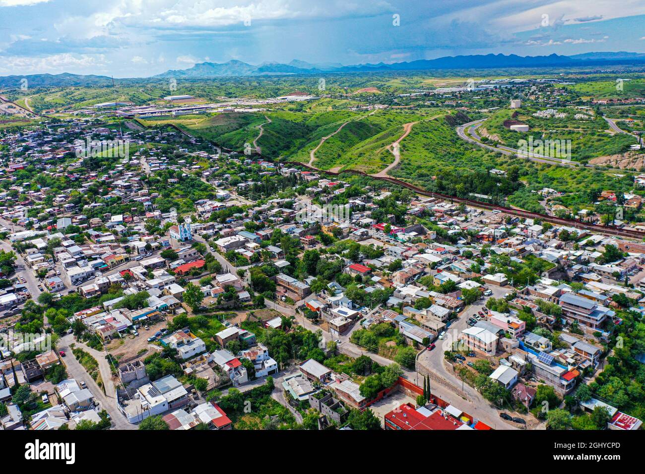 Aerial view of the border wall in Nogales Sonora (L) in Mexico and ...