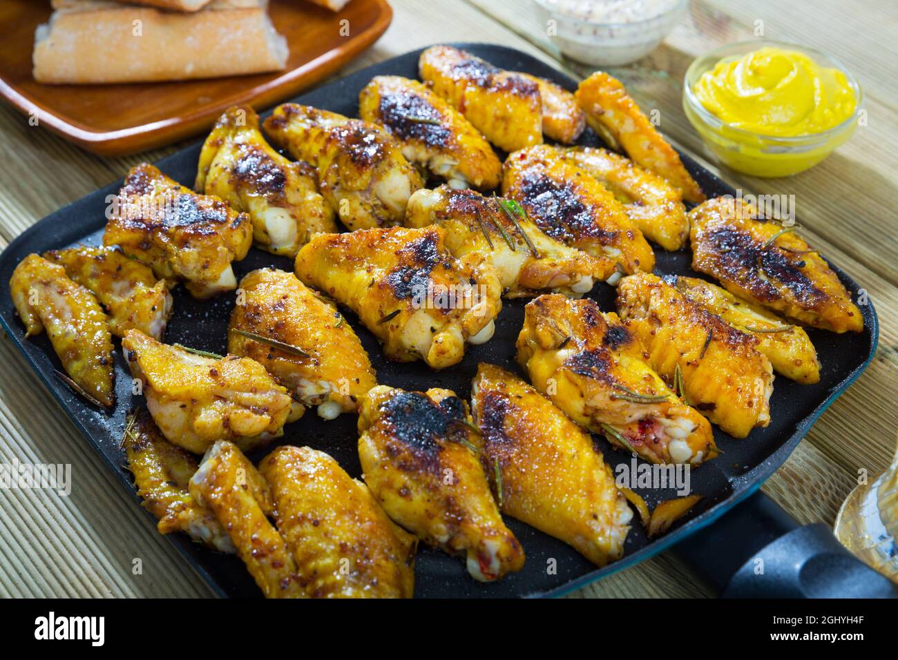 Baked Chicken Wings With Sauce On Frying Pan Stock Photo Alamy